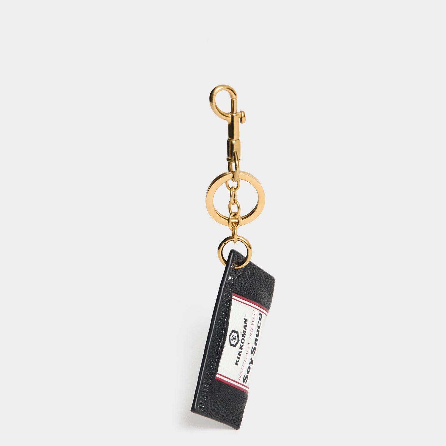 Anya Brands Kikkoman Charm -

          
            Capra Leather in Black -
          

          Anya Hindmarch UK
