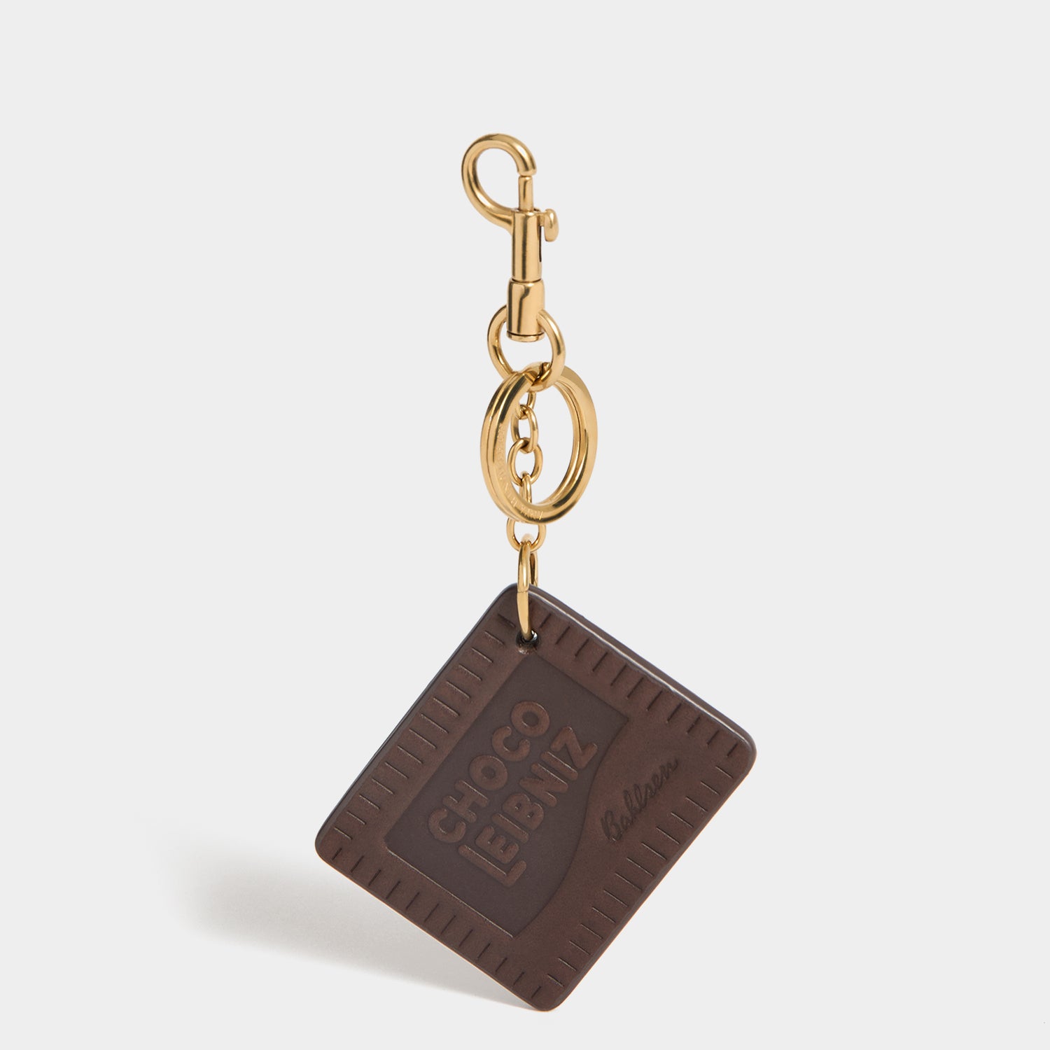 Anya Brands Choco Leibniz Charm -

          
            Capra Leather in Chocolate -
          

          Anya Hindmarch UK
