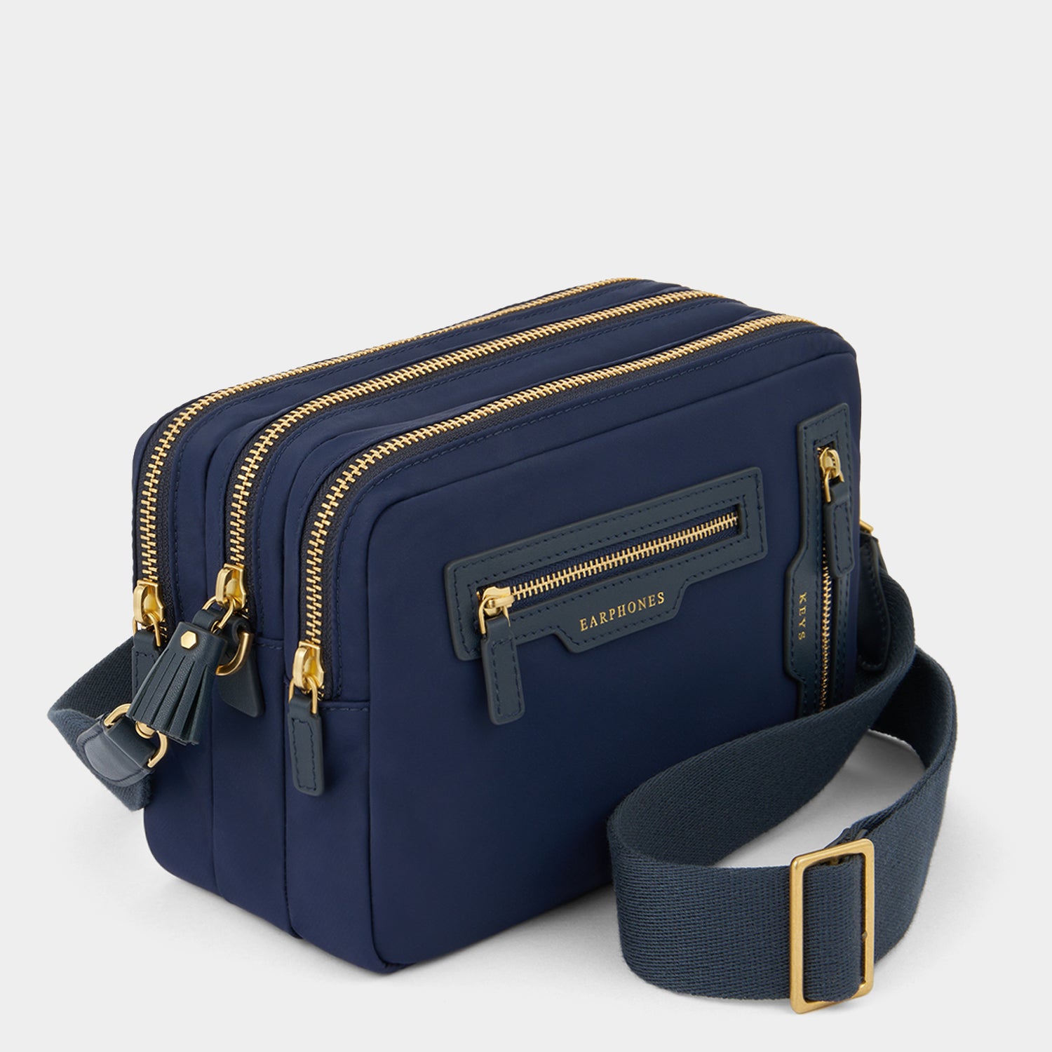 Triple Zip Cross-body -

          
            Regenerated ECONYL® Nylon in Marine -
          

          Anya Hindmarch UK
