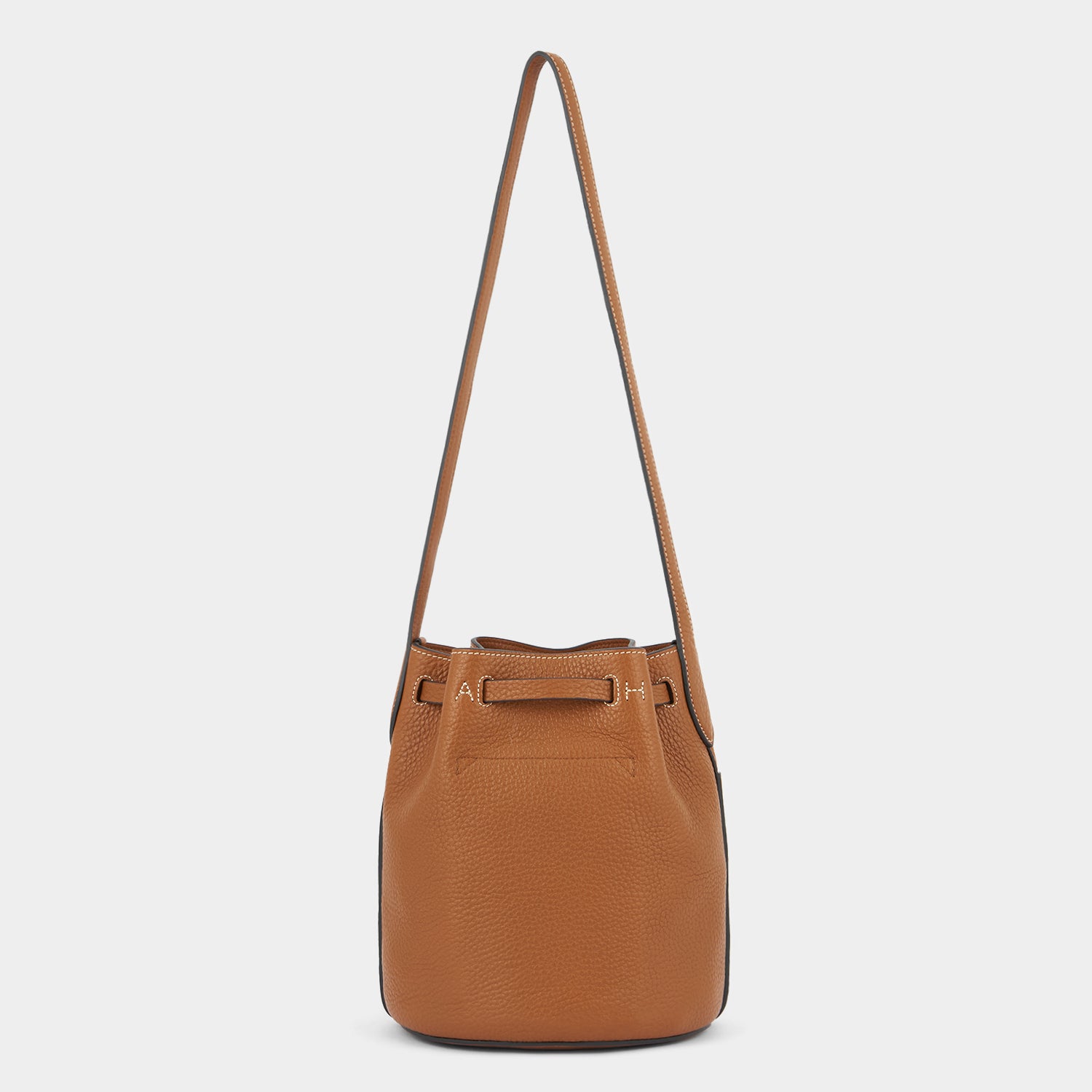 Return To Nature Small Bucket Bag -

          
            Natural Grain Leather in Pecan Brown -
          

          Anya Hindmarch UK
