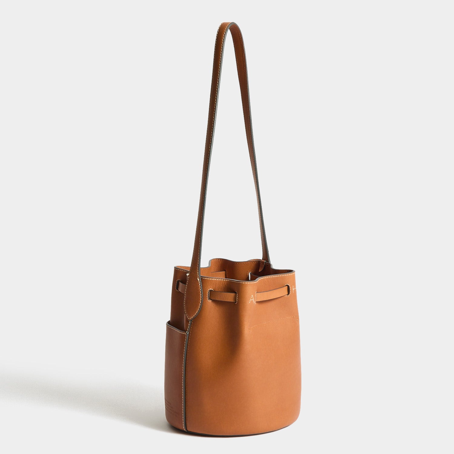 Return To Nature Small Bucket Bag -

          
            Natural Grain Leather in Pecan Brown -
          

          Anya Hindmarch UK

