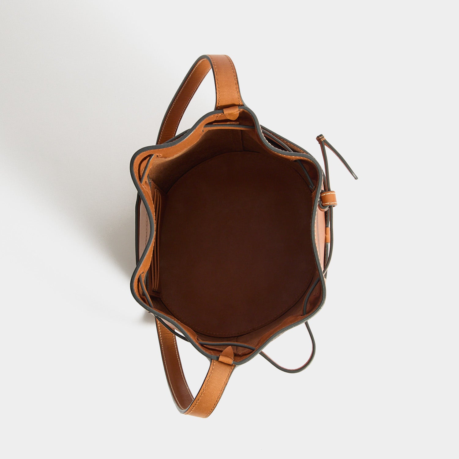 Return To Nature Small Bucket Bag -

          
            Natural Grain Leather in Pecan Brown -
          

          Anya Hindmarch UK
