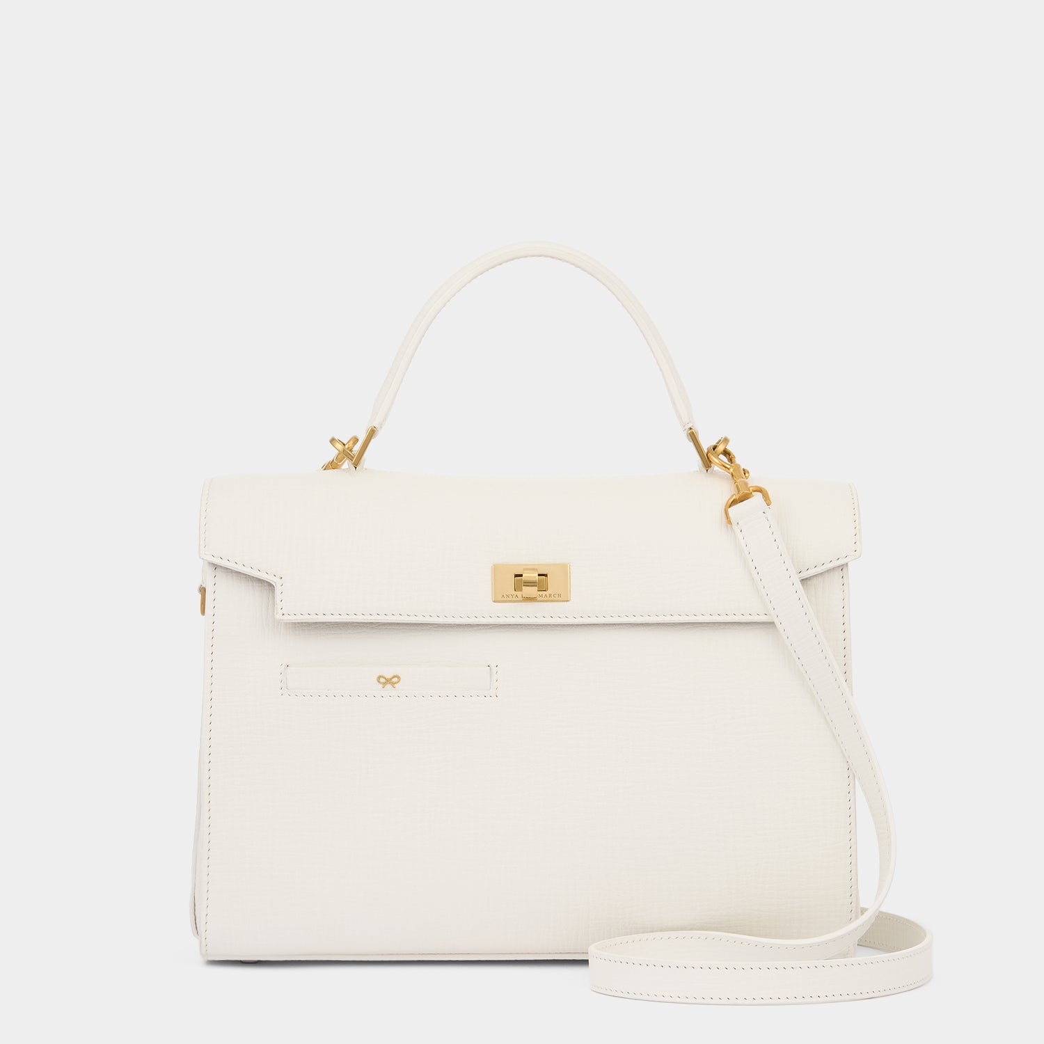 White crosshatch leather cross-body bag handcrafted in Italy by Anya Hindmarch