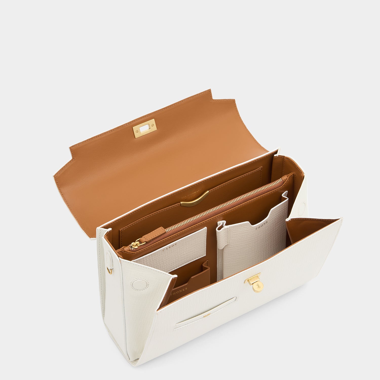 White crosshatch leather cross-body bag handcrafted in Italy by Anya Hindmarch