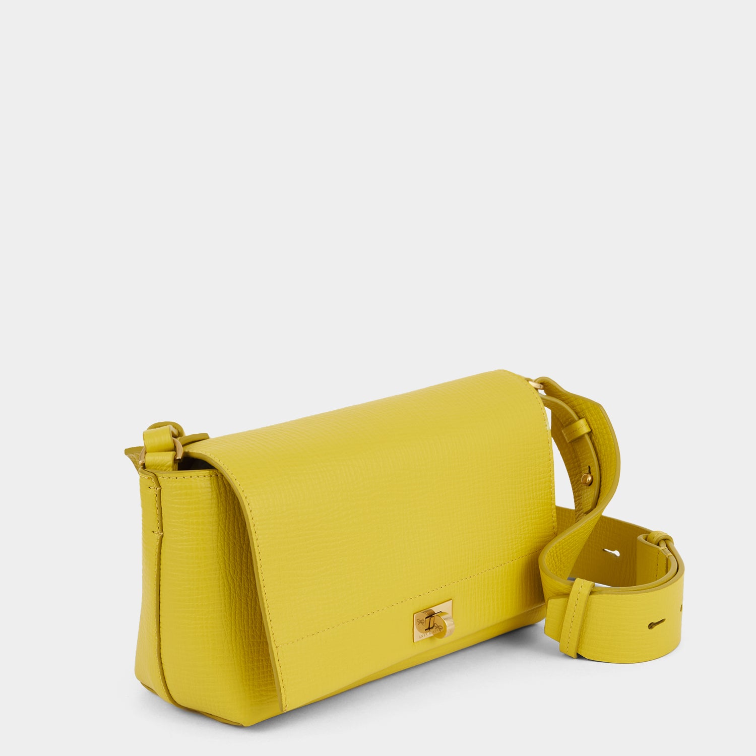 Yellow crosshatch leather crossbody bag by Anya Hindmarch