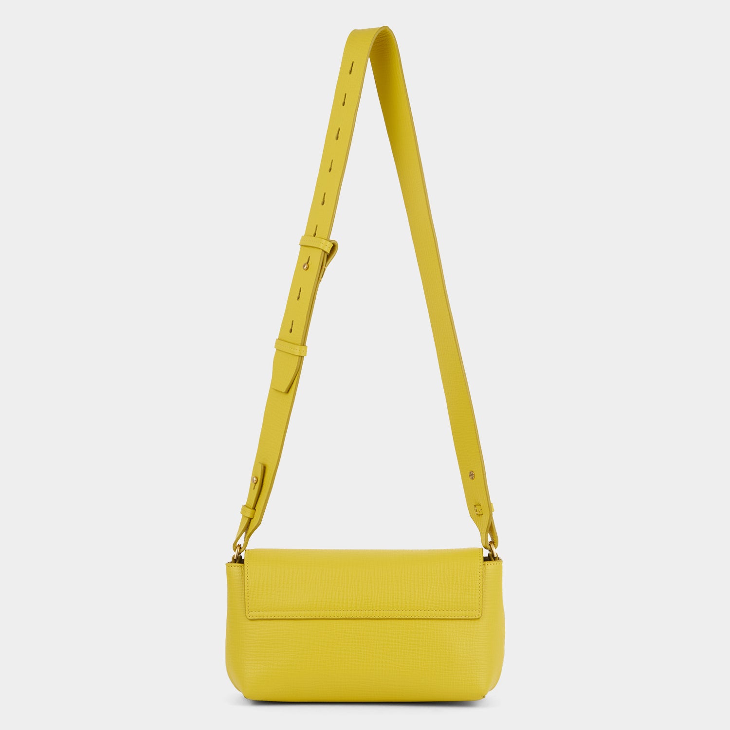 Yellow crosshatch leather crossbody bag by Anya Hindmarch