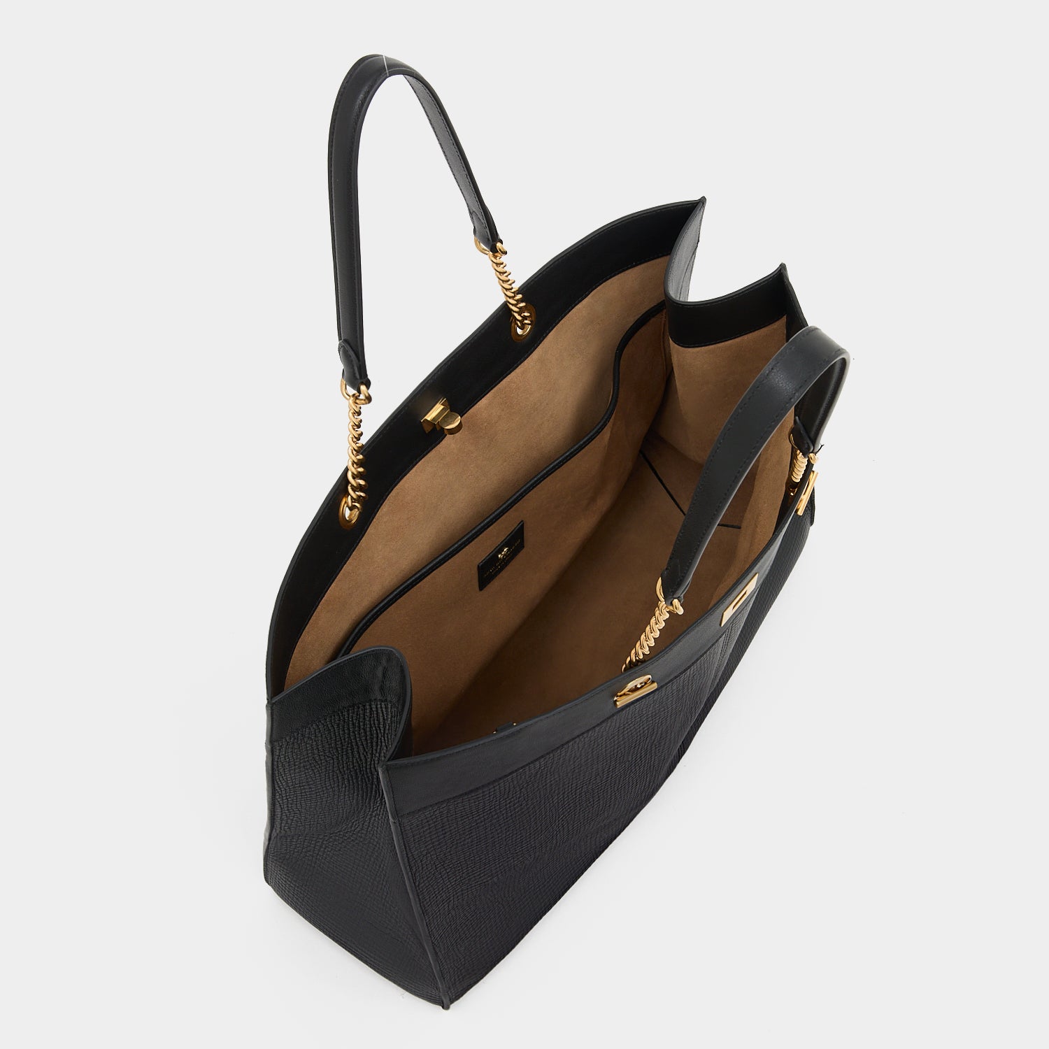 Mortimer Eyelet Tote -

          
            Crosshatch Leather in Black -
          

          Anya Hindmarch UK
