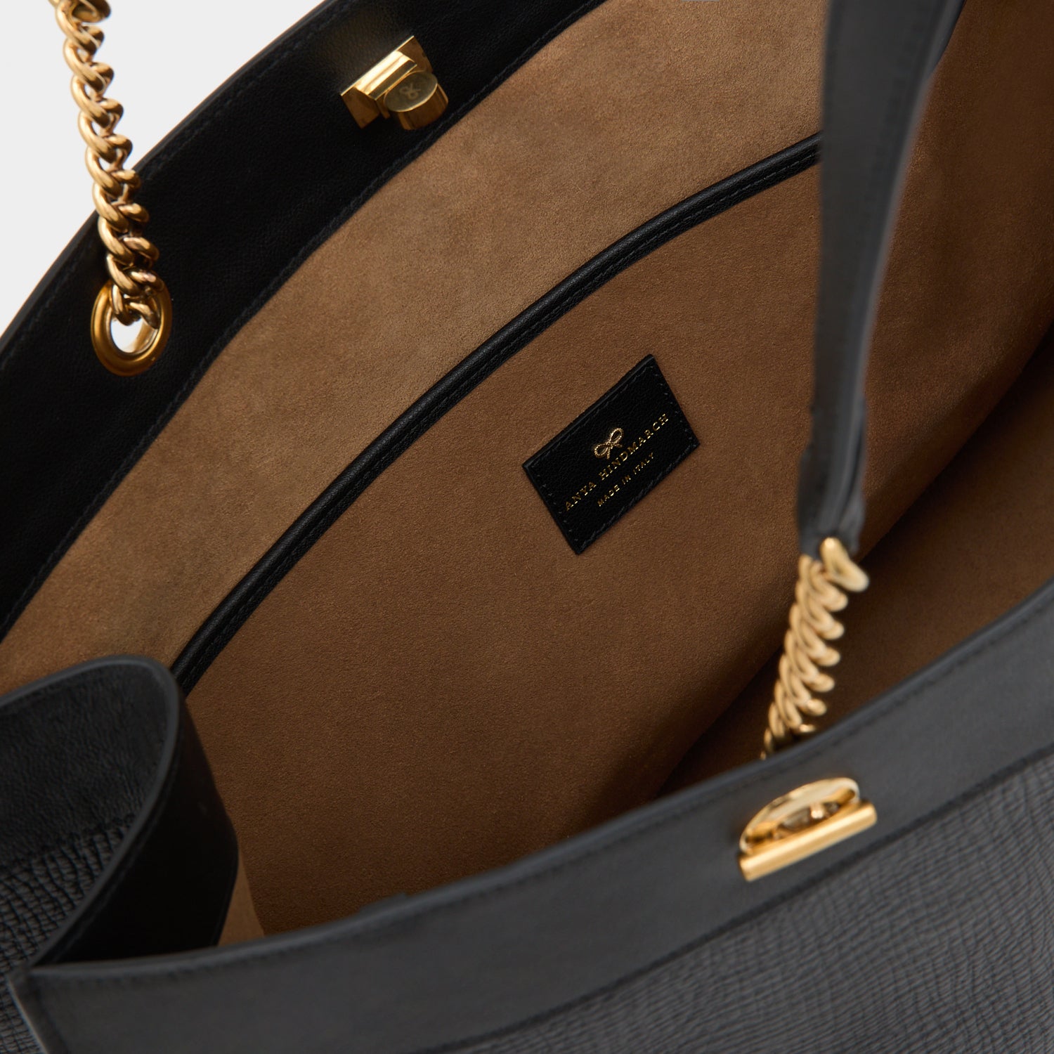 Mortimer Eyelet Tote -

          
            Crosshatch Leather in Black -
          

          Anya Hindmarch UK
