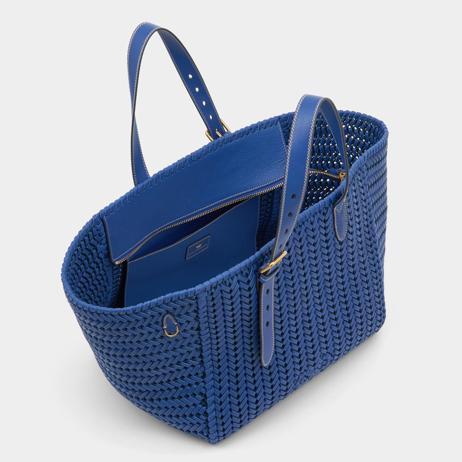 Blue leather stitch tote bag by Anya Hindmarch