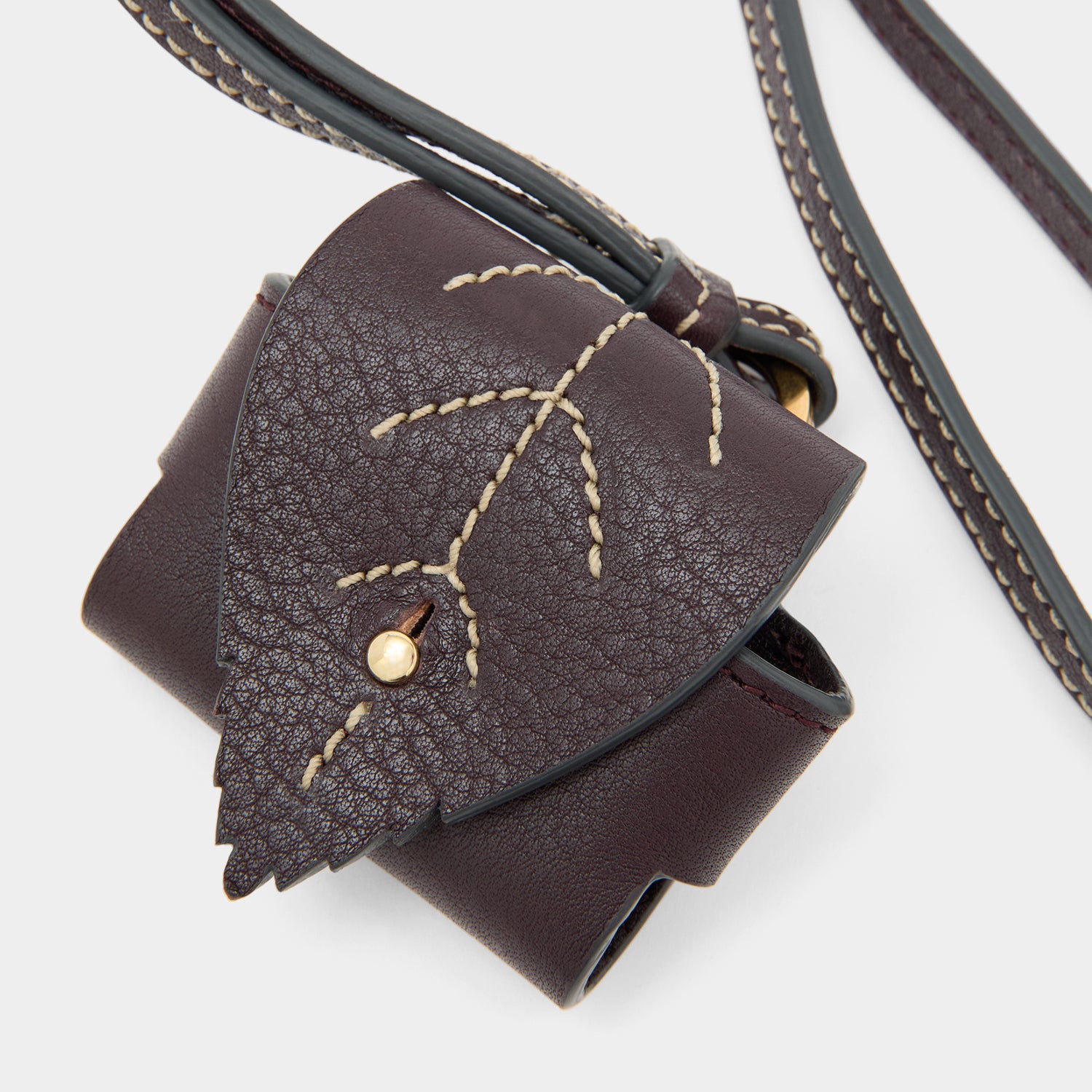 RTN Earphone Case -

          
            Natural Grain Leather in Grape -
          

          Anya Hindmarch UK
