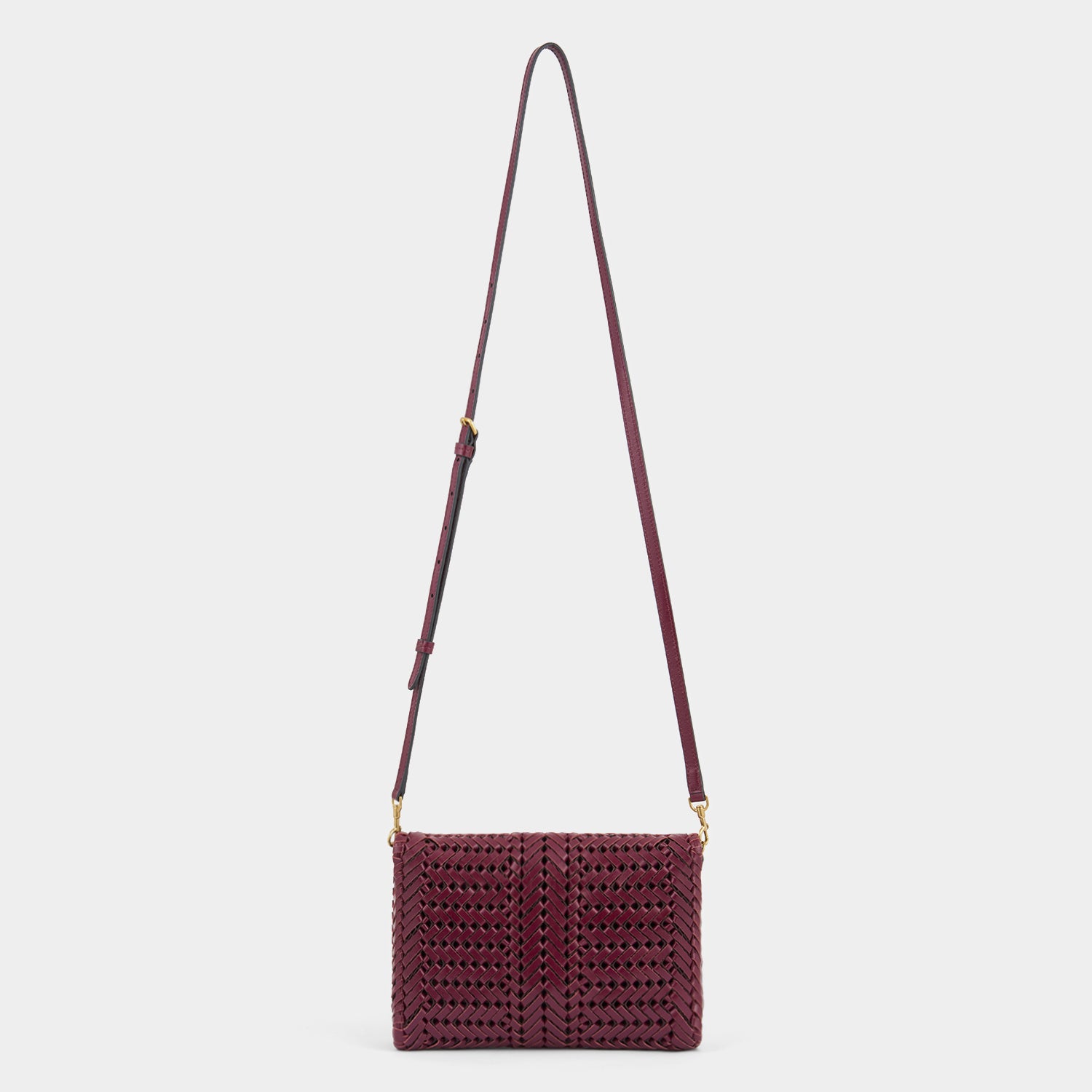 Purple calf leather cross body bag by Anya Hindmarch