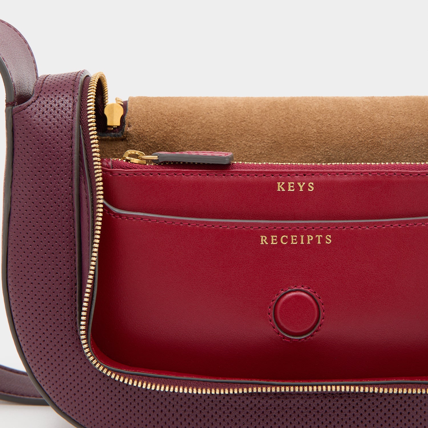 Vere Perforated Small Cross-body -

          
            Perforated Leather in Orchid Purple -
          

          Anya Hindmarch UK
