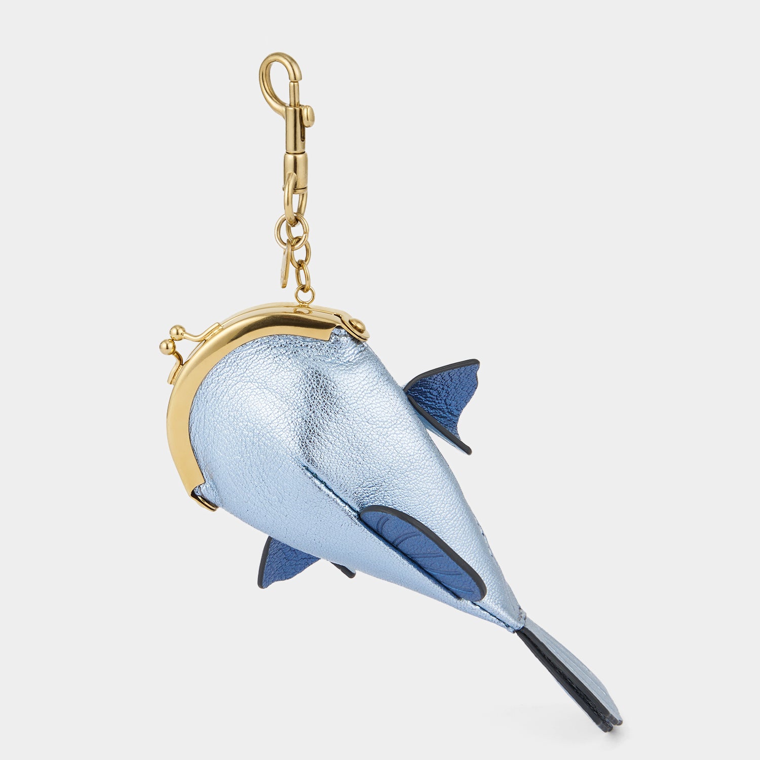 Fish-shaped blue coin purse by Anya Hindmarch