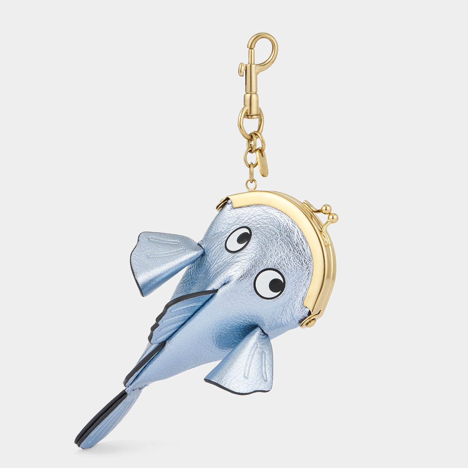 Fish-shaped blue coin purse by Anya Hindmarch