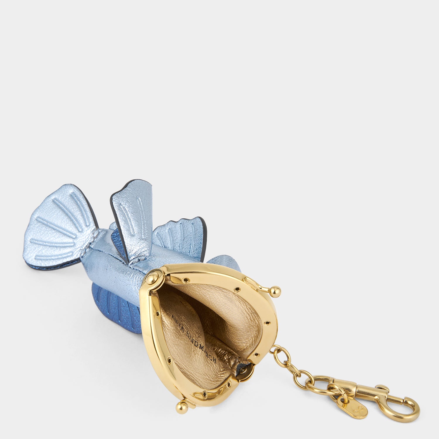 Fish-shaped blue coin purse by Anya Hindmarch