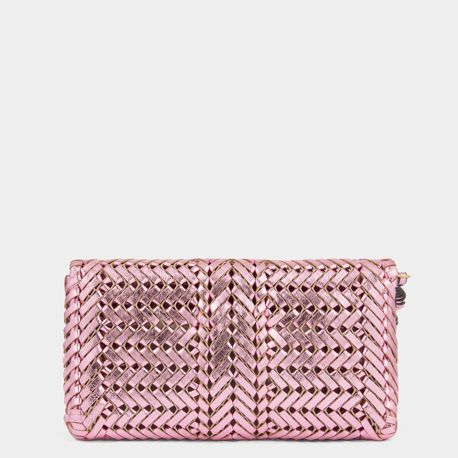 Metallic pink handwoven leather clutch bag by Anya Hindmarch
