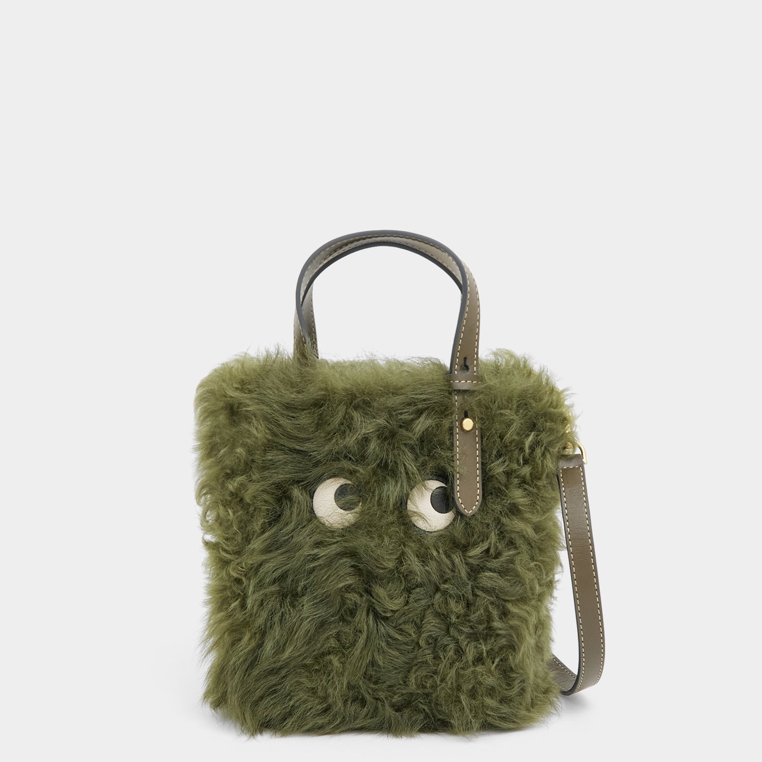 N/S Mini Eyes Shearling Tote -

          
            Shearling/Smooth Leather in Khaki Green -
          

          Anya Hindmarch UK
