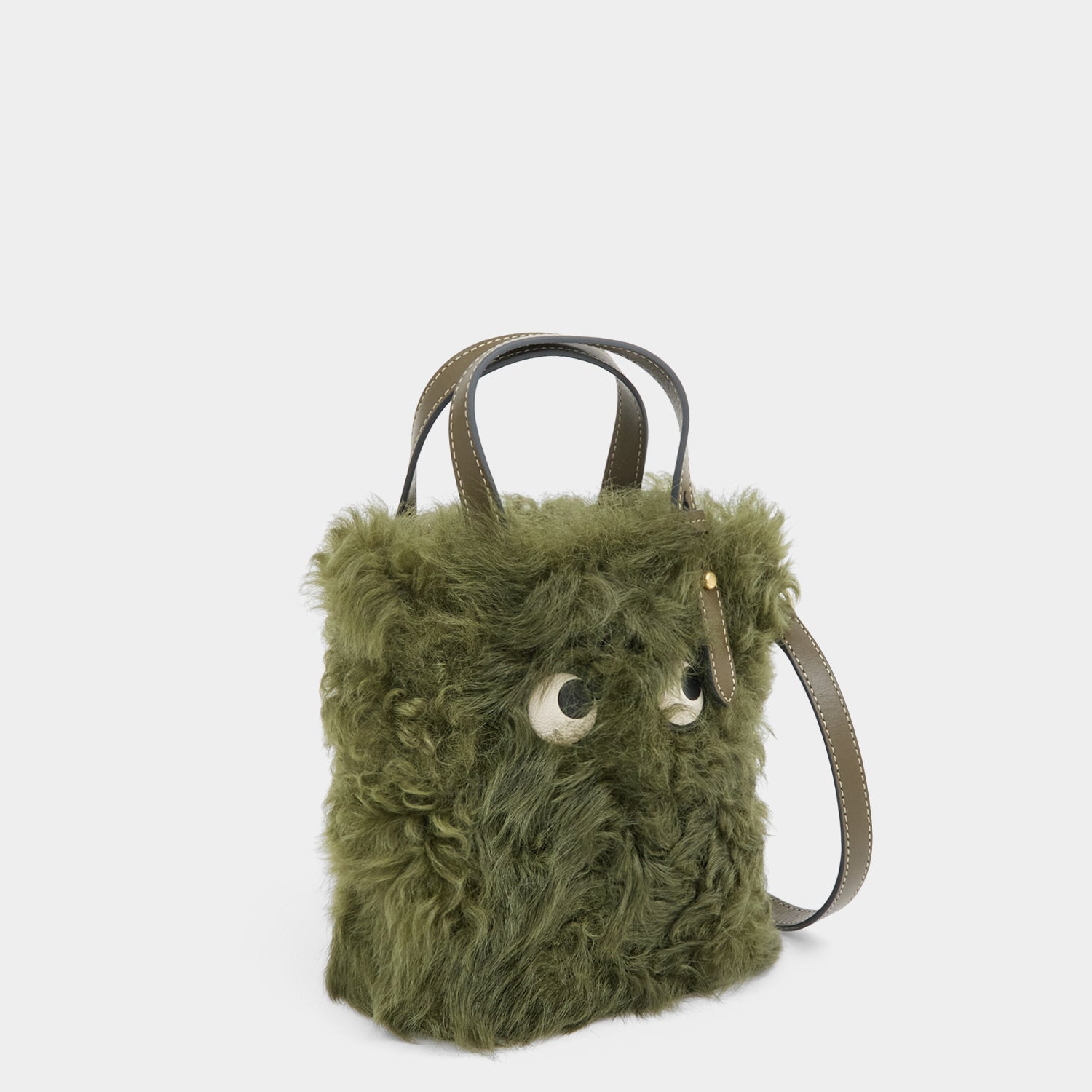 N/S Mini Eyes Shearling Tote -

          
            Shearling/Smooth Leather in Khaki Green -
          

          Anya Hindmarch UK
