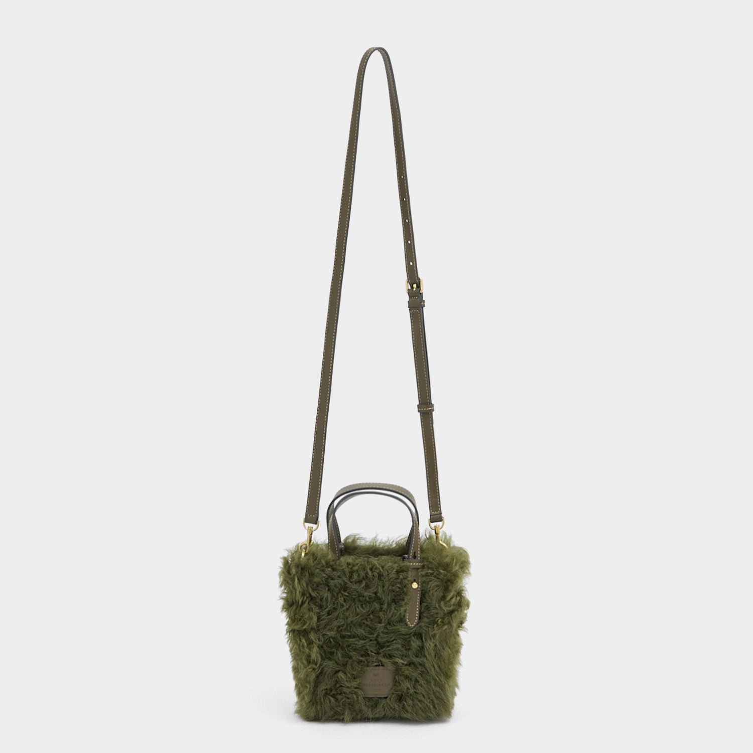 N/S Mini Eyes Shearling Tote -

          
            Shearling/Smooth Leather in Khaki Green -
          

          Anya Hindmarch UK
