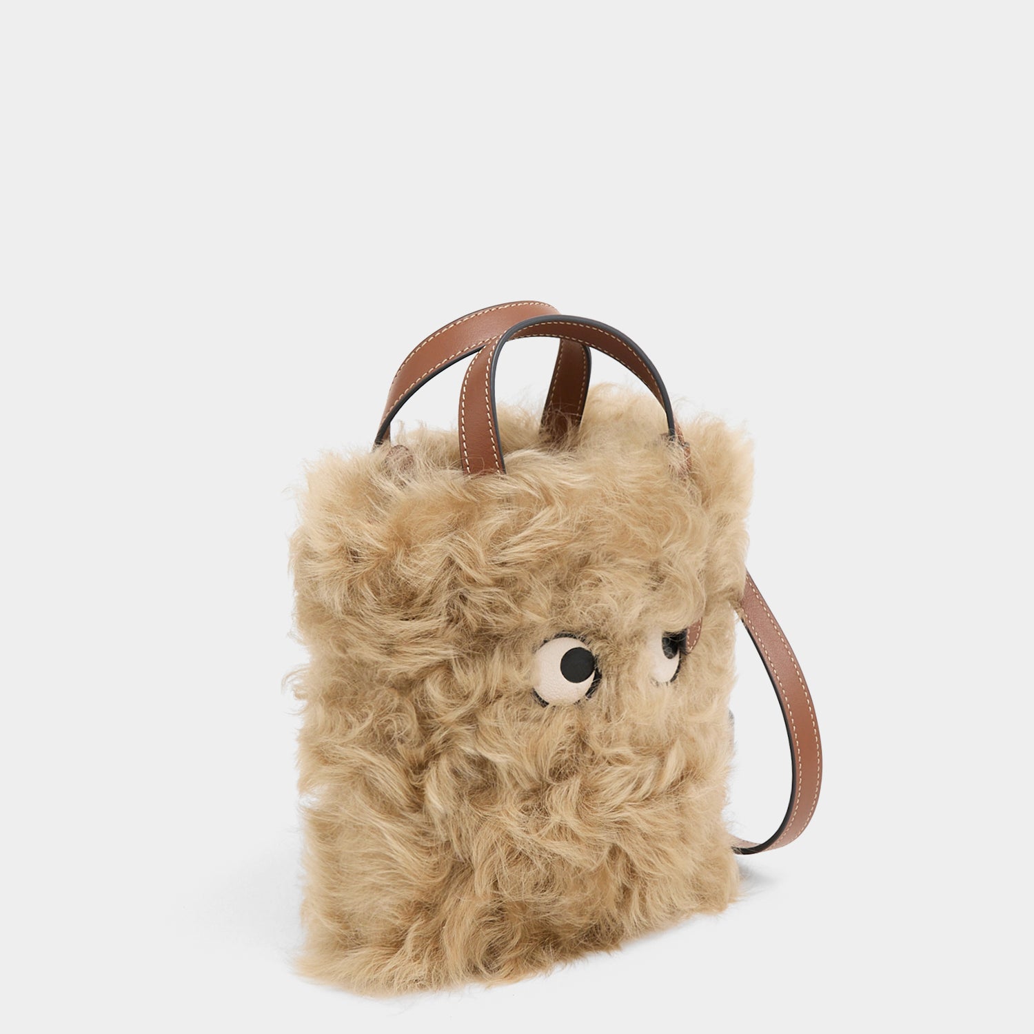 N/S Mini Eyes Shearling Tote -

          
            Shearling/Smooth Leather in Taupe -
          

          Anya Hindmarch UK
