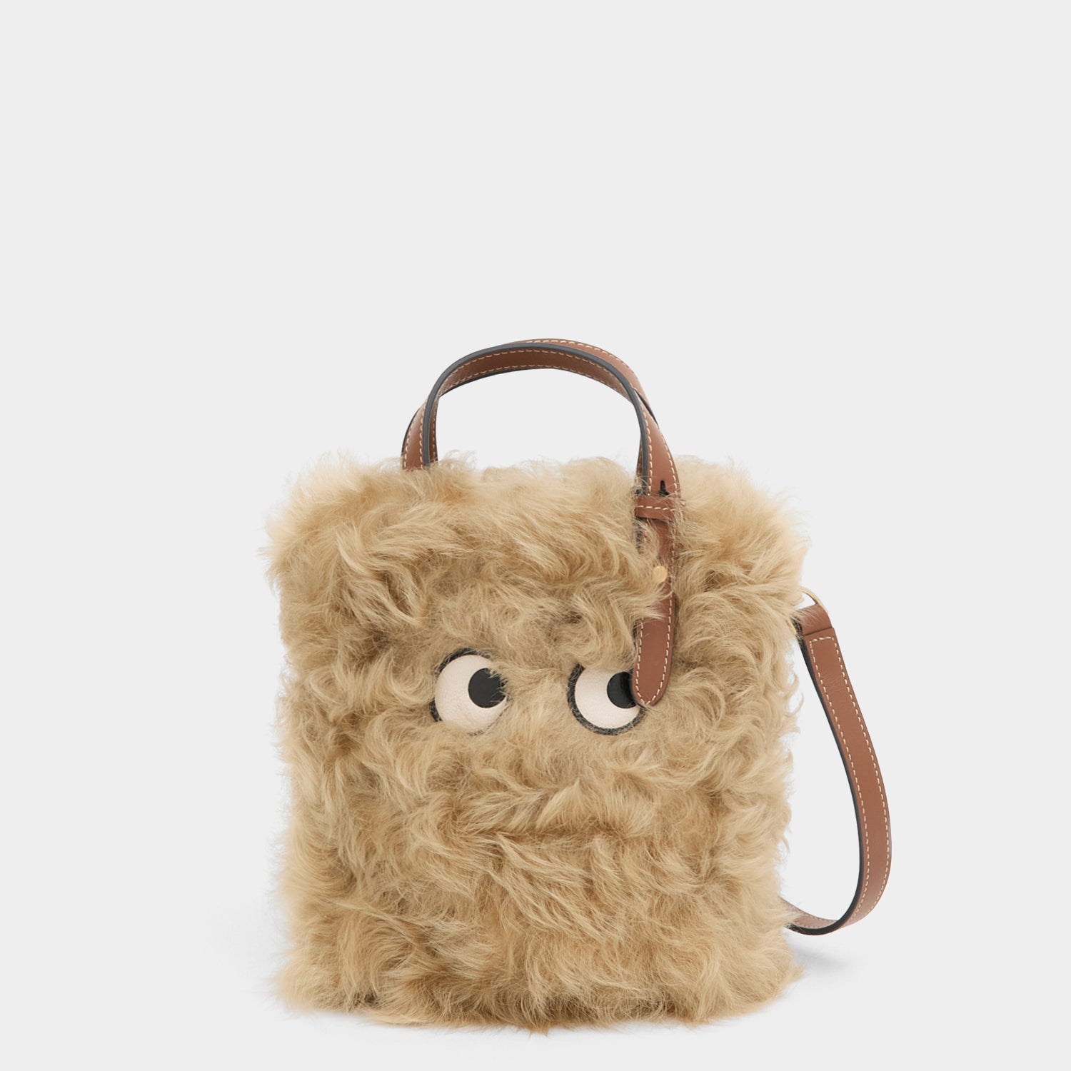 N/S Mini Eyes Shearling Tote -

          
            Shearling/Smooth Leather in Taupe -
          

          Anya Hindmarch UK
