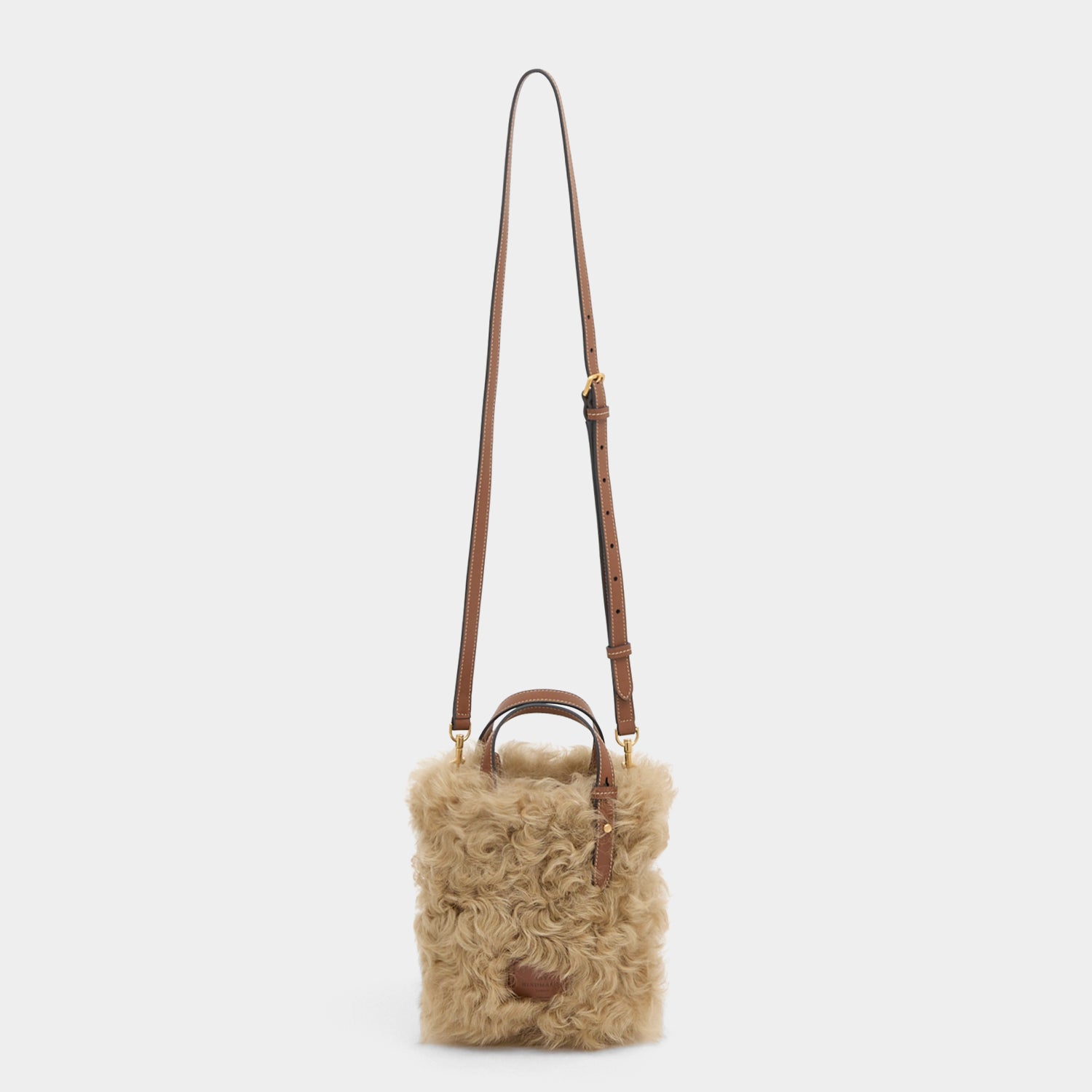 N/S Mini Eyes Shearling Tote -

          
            Shearling/Smooth Leather in Taupe -
          

          Anya Hindmarch UK
