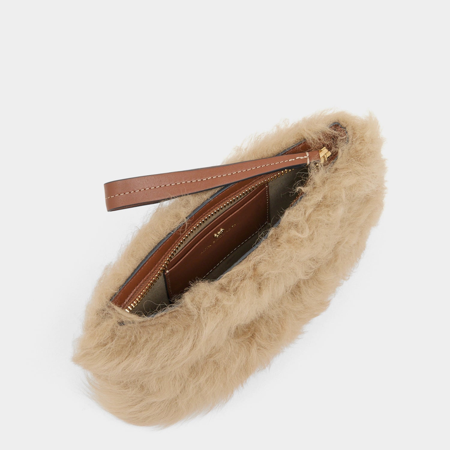 Shearling Eyes Clutch -

          
            Shearling/Smooth Leather leather in Taupe -
          

          Anya Hindmarch UK
