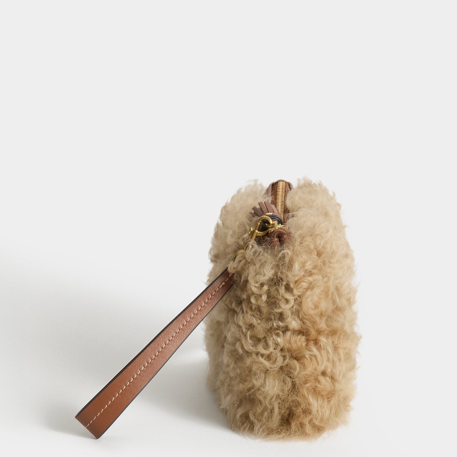 Shearling Eyes Clutch -

          
            Shearling/Smooth Leather leather in Taupe -
          

          Anya Hindmarch UK
