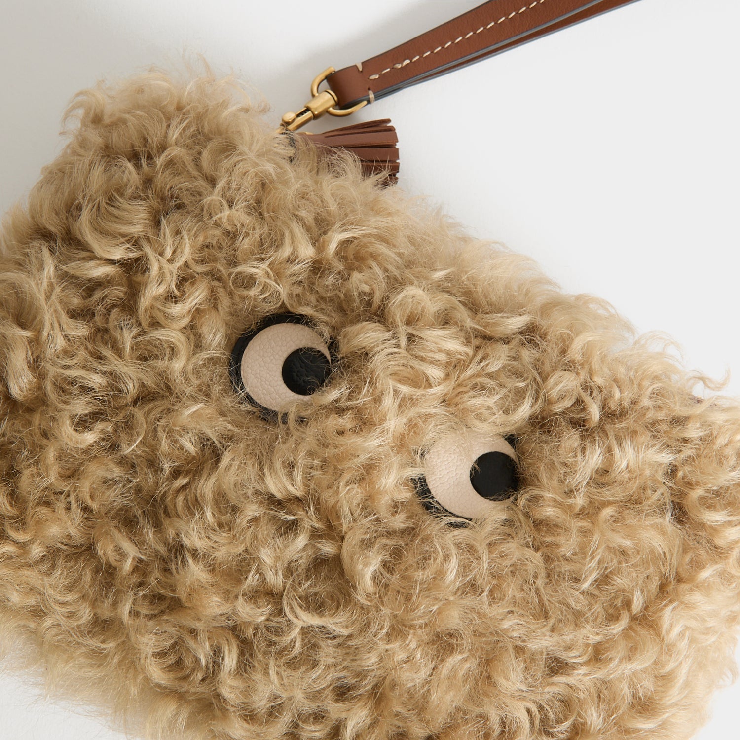 Shearling Eyes Clutch -

          
            Shearling/Smooth Leather leather in Taupe -
          

          Anya Hindmarch UK

