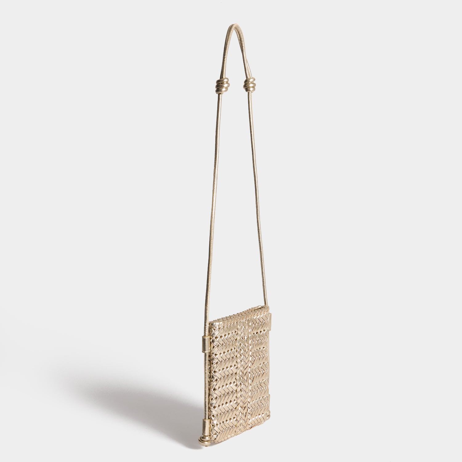 Neeson Cross-body Pouch -

          
            Capra Leather in Platino Gold -
          

          Anya Hindmarch UK
