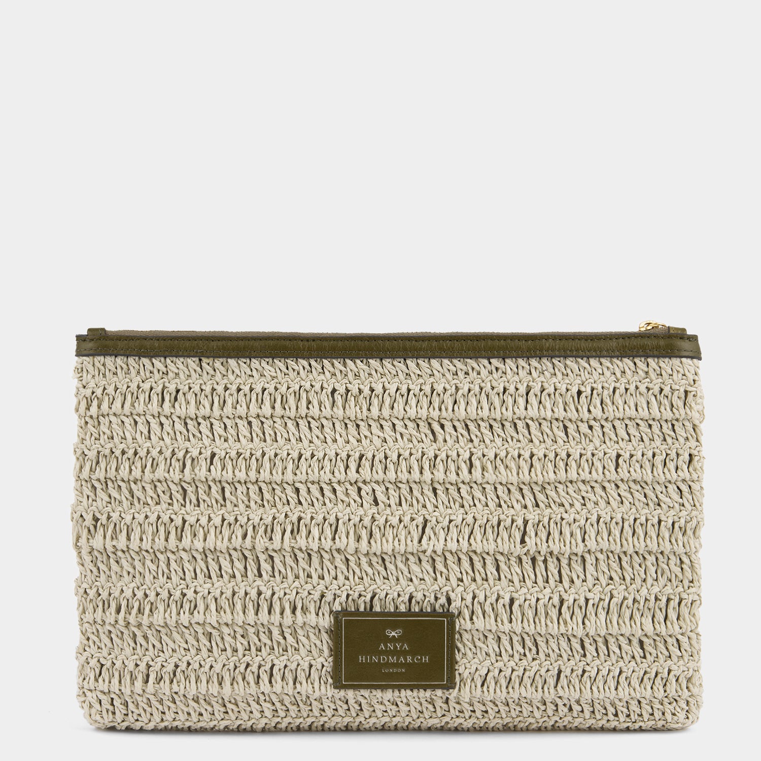 Raffia pochette with winky emoji by Anya Hindmarch