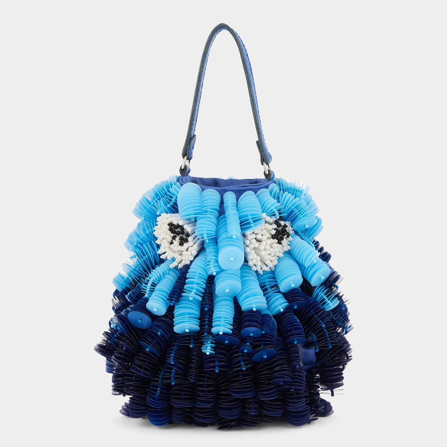 Blue beaded crossbody bag shaped like a fish by Anya Hindmarch