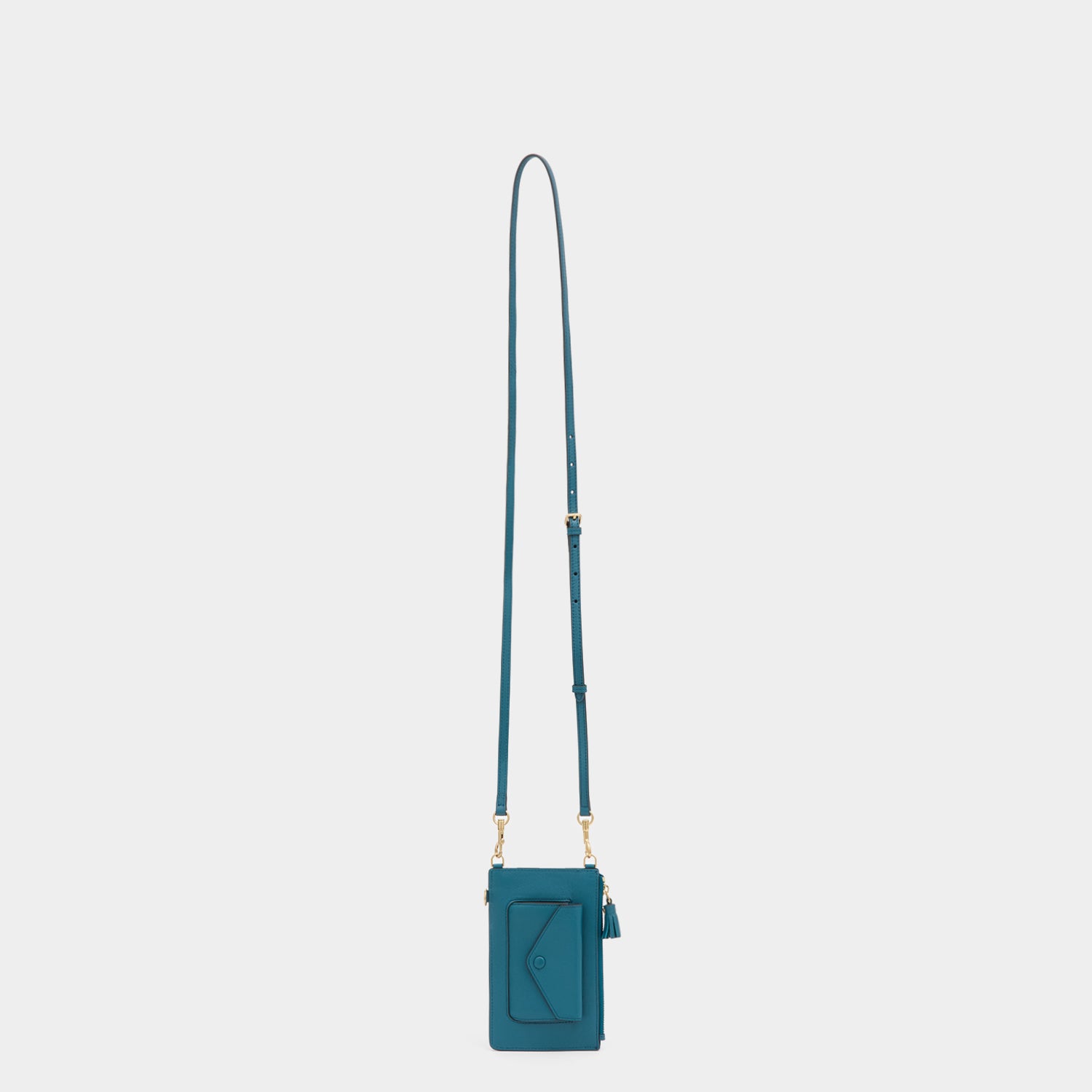 Anya Brands Frosted Flakes Zip Phone Pouch -

          
            Shiny Capra Leather in Light Petrol -
          

          Anya Hindmarch UK
