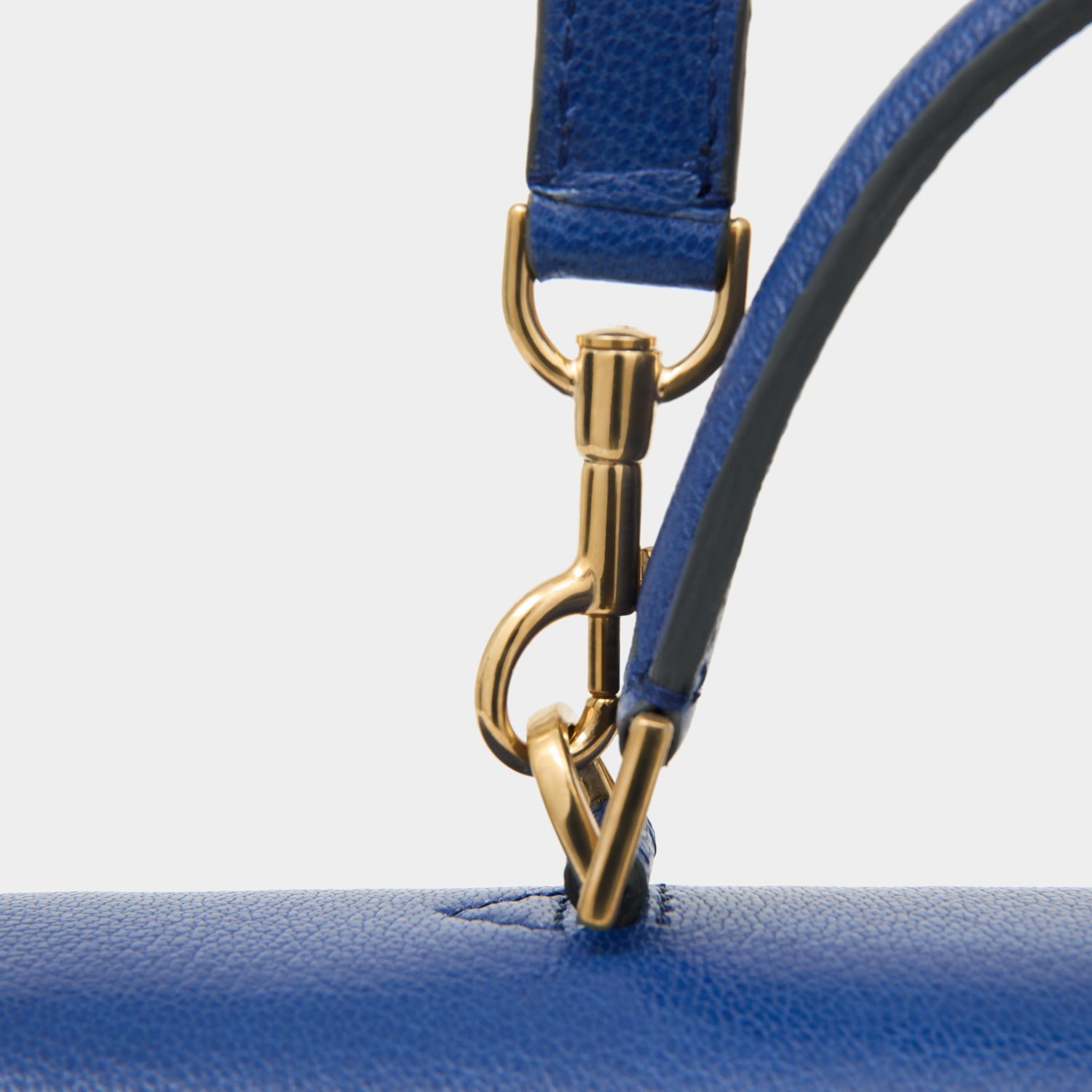Peanuts Snoopy Mortimer Top Handle -

          
            Capra Leather in Monday Blue -
          

          Anya Hindmarch UK
