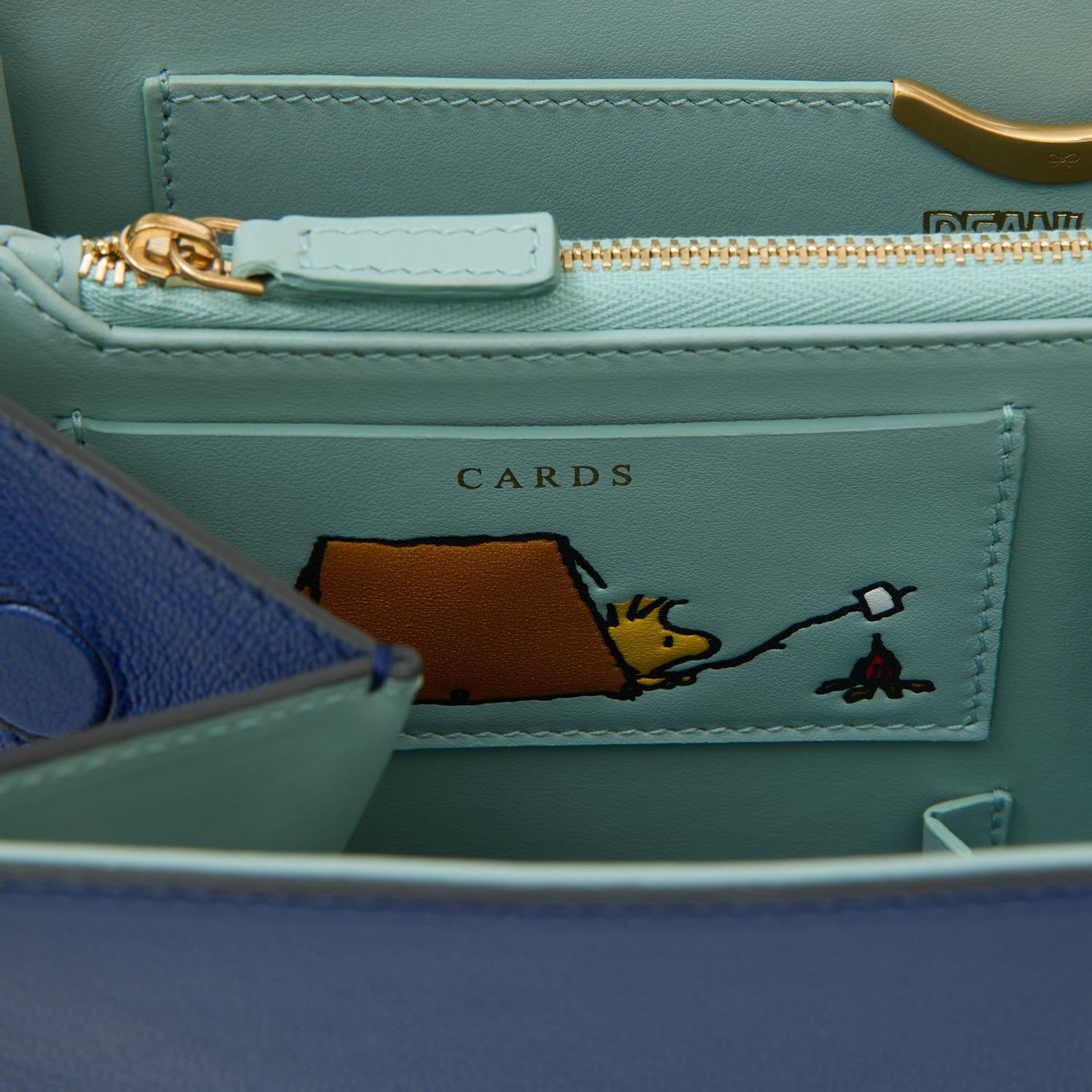 Peanuts Snoopy Mortimer Top Handle -

          
            Capra Leather in Monday Blue -
          

          Anya Hindmarch UK
