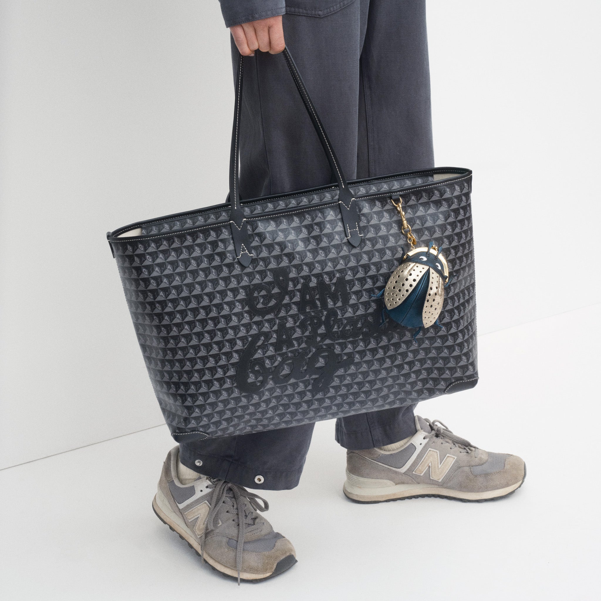 I Am A Plastic Bag Zipped Motif Tote -

          
            Recycled Canvas in Black -
          

          Anya Hindmarch UK
