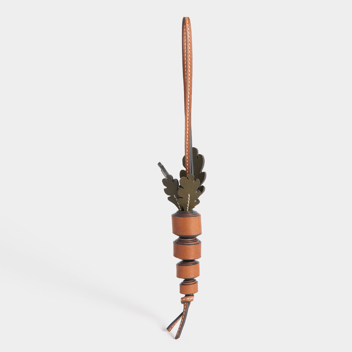 Return to Nature Carrot Charm -

          
            Compostable Leather in Pecan -
          

          Anya Hindmarch UK
