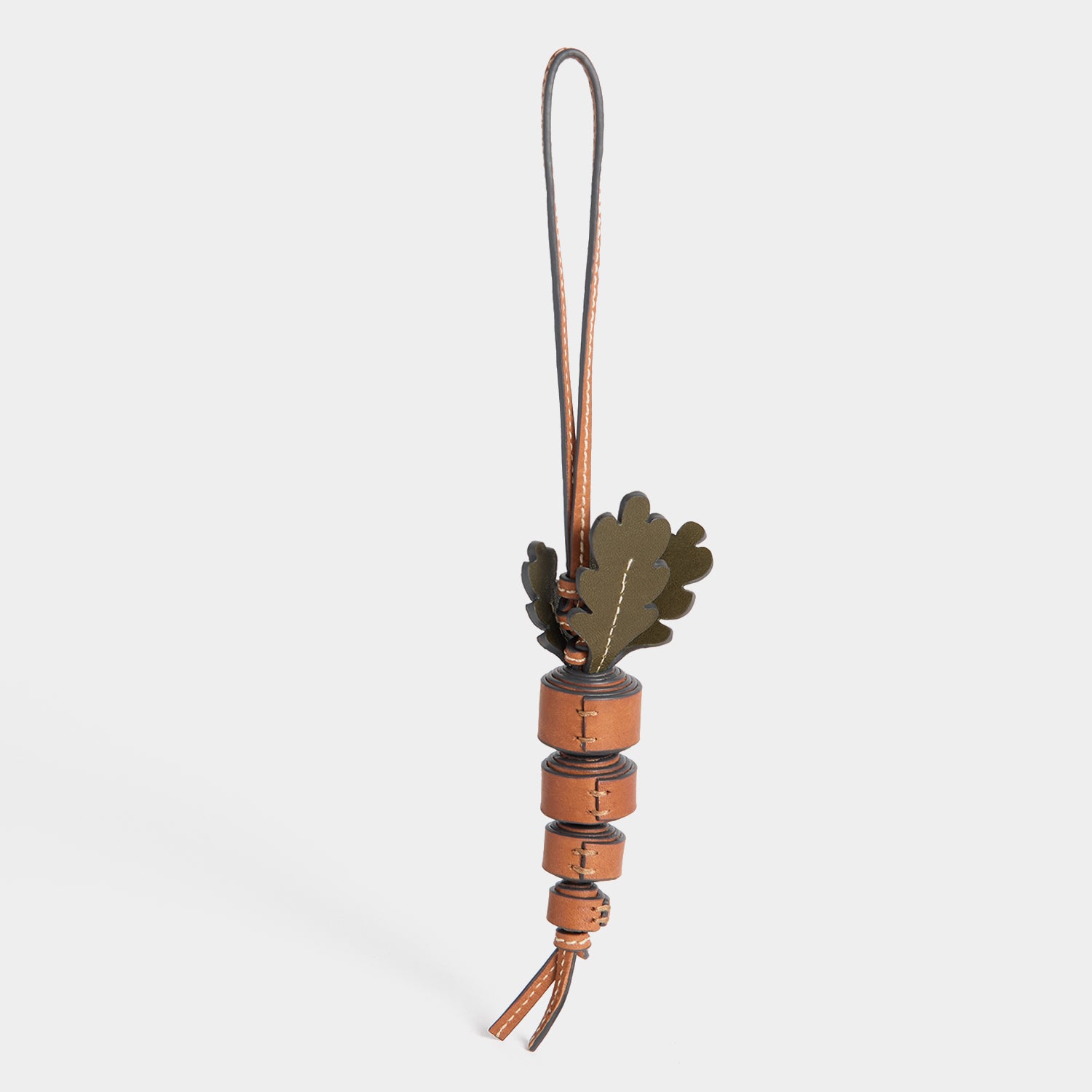 Return to Nature Carrot Charm -

          
            Compostable Leather in Pecan -
          

          Anya Hindmarch UK
