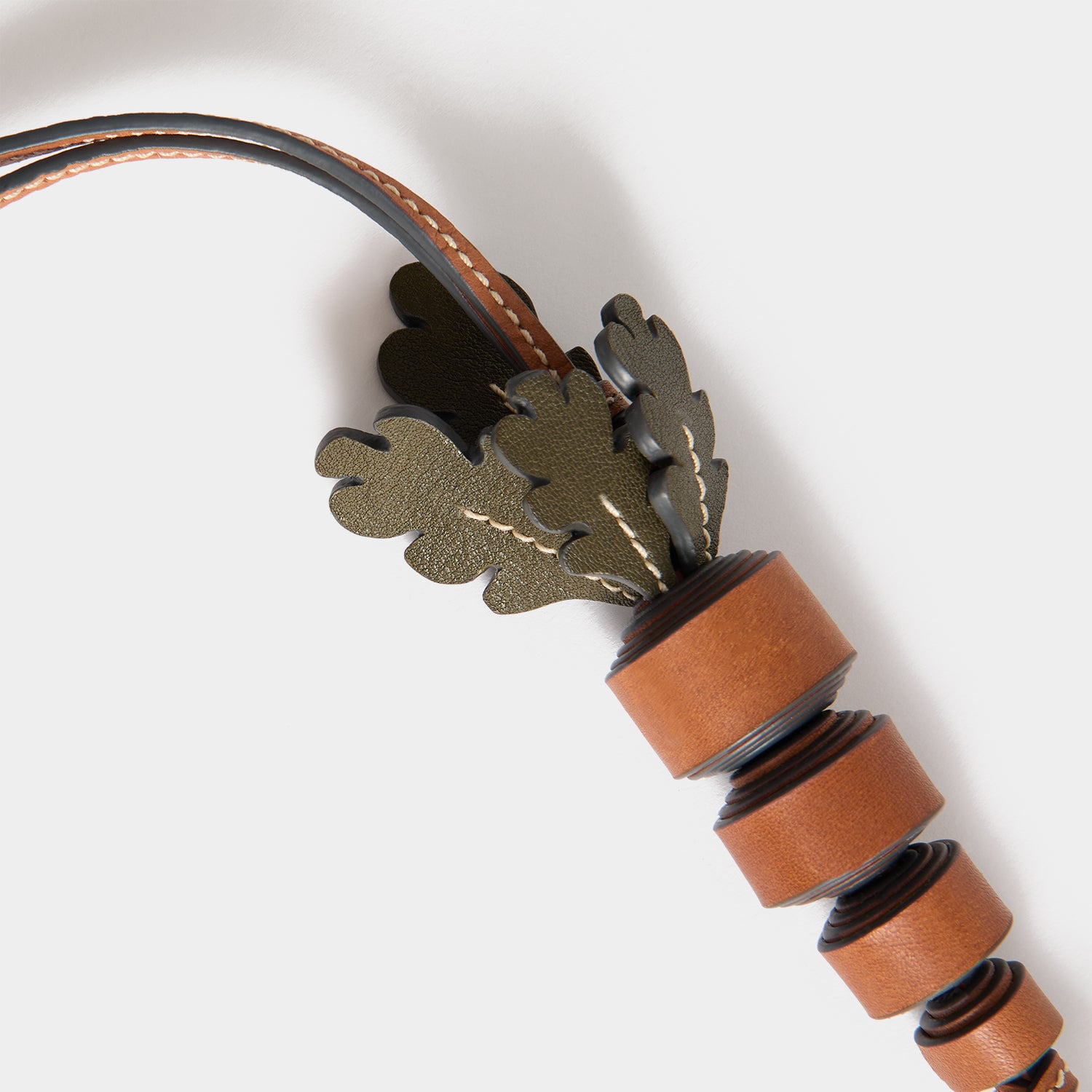 Return to Nature Carrot Charm -

          
            Compostable Leather in Pecan -
          

          Anya Hindmarch UK
