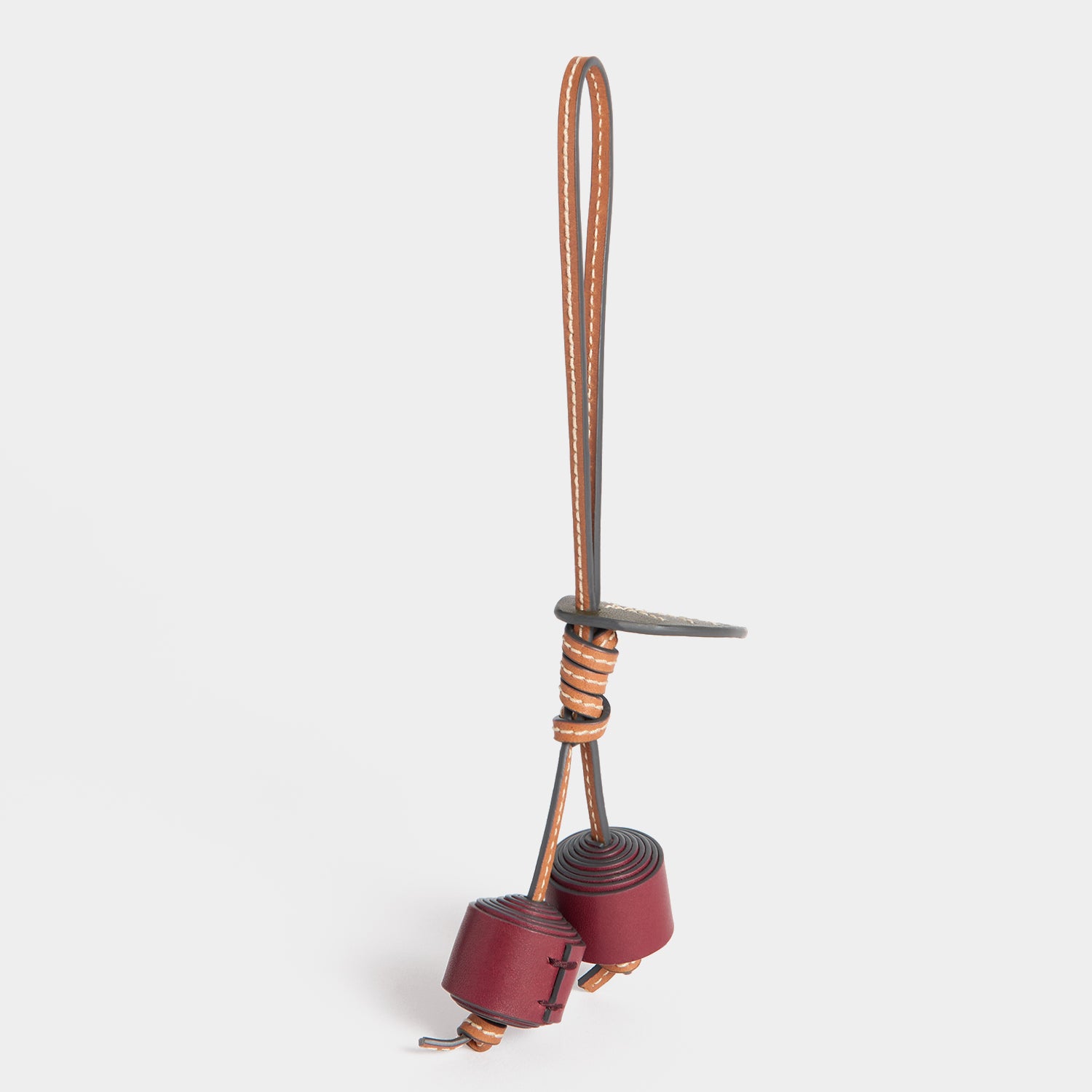 Return to Nature Cherry Charm -

          
            Compostable Leather in Pecan -
          

          Anya Hindmarch UK
