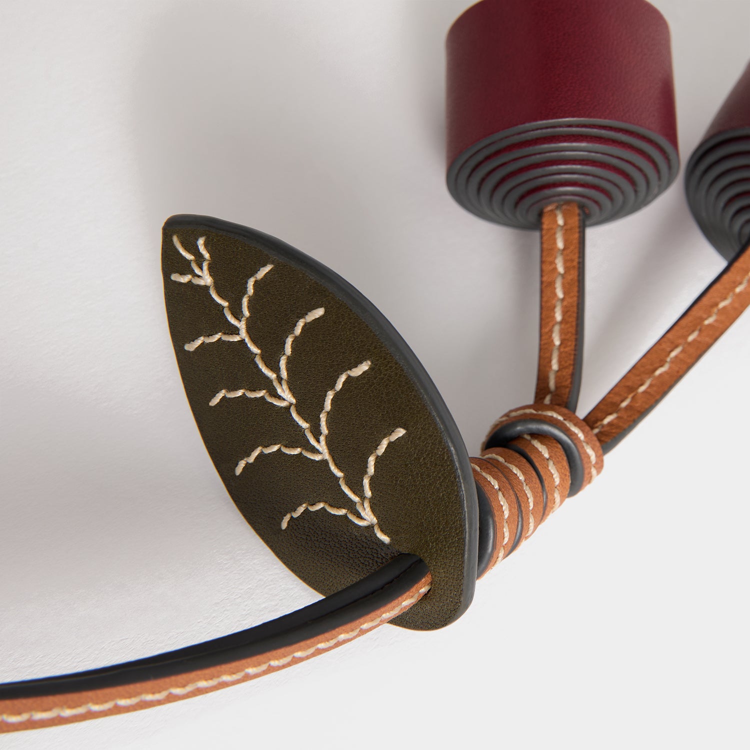 Return to Nature Cherry Charm -

          
            Compostable Leather in Pecan -
          

          Anya Hindmarch UK
