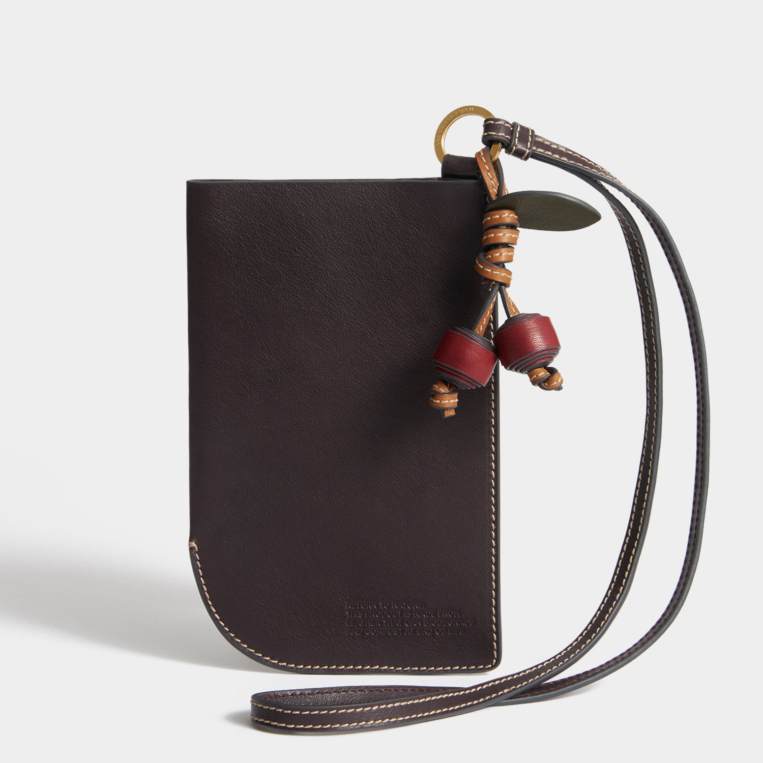 Return To Nature Strap Phone Pouch -

          
            Natural Grain Leather in Grape -
          

          Anya Hindmarch UK
