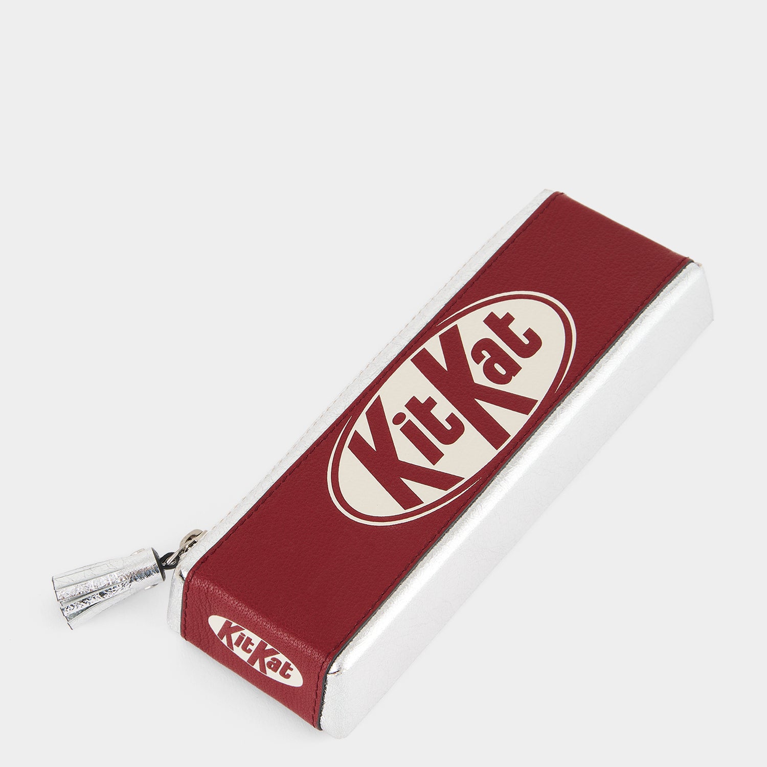 Anya Brands Kit Kat Pencil Case -

          
            Calf Leather in Red and Metallic Silver -
          

          Anya Hindmarch UK
