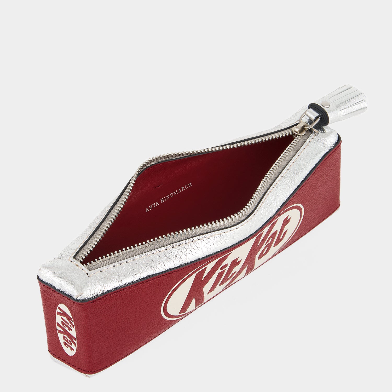 Anya Brands Kit Kat Pencil Case -

          
            Calf Leather in Red and Metallic Silver -
          

          Anya Hindmarch UK
