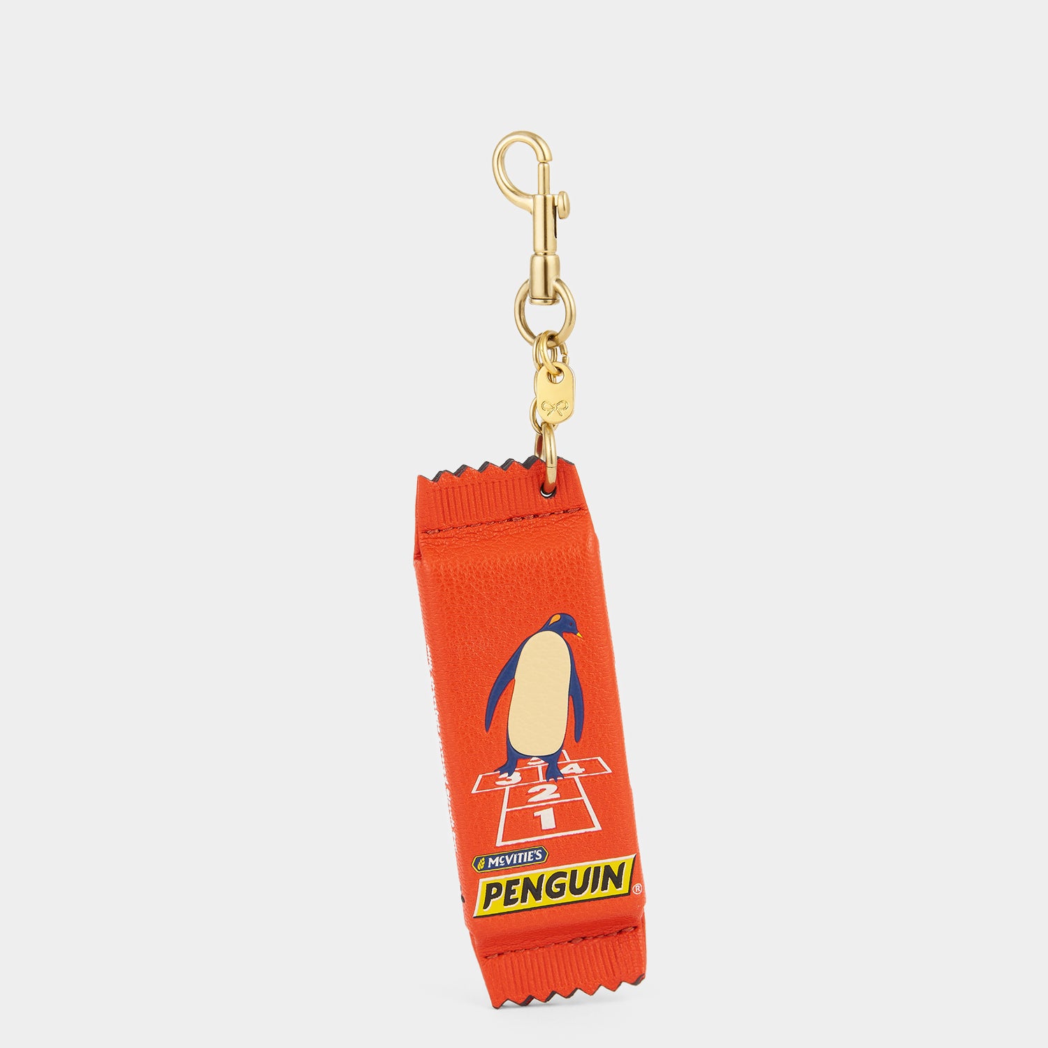 Anya Brands McVitie's Penguin Charm -

          
            Calf Leather in Flag Red -
          

          Anya Hindmarch UK
