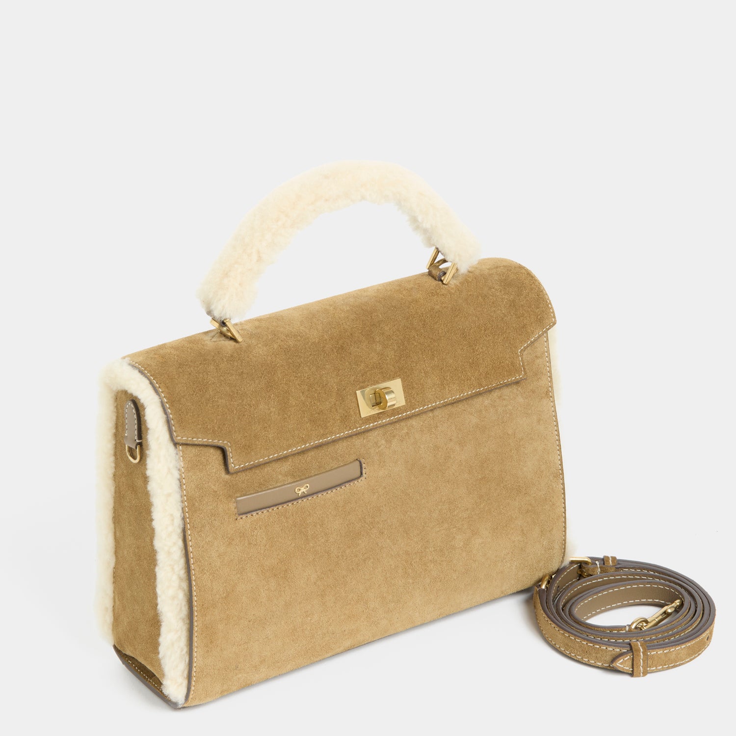 Mortimer Shearling Top Handle -

          
            Shearling/Suede Leather in Moutarde -
          

          Anya Hindmarch UK
