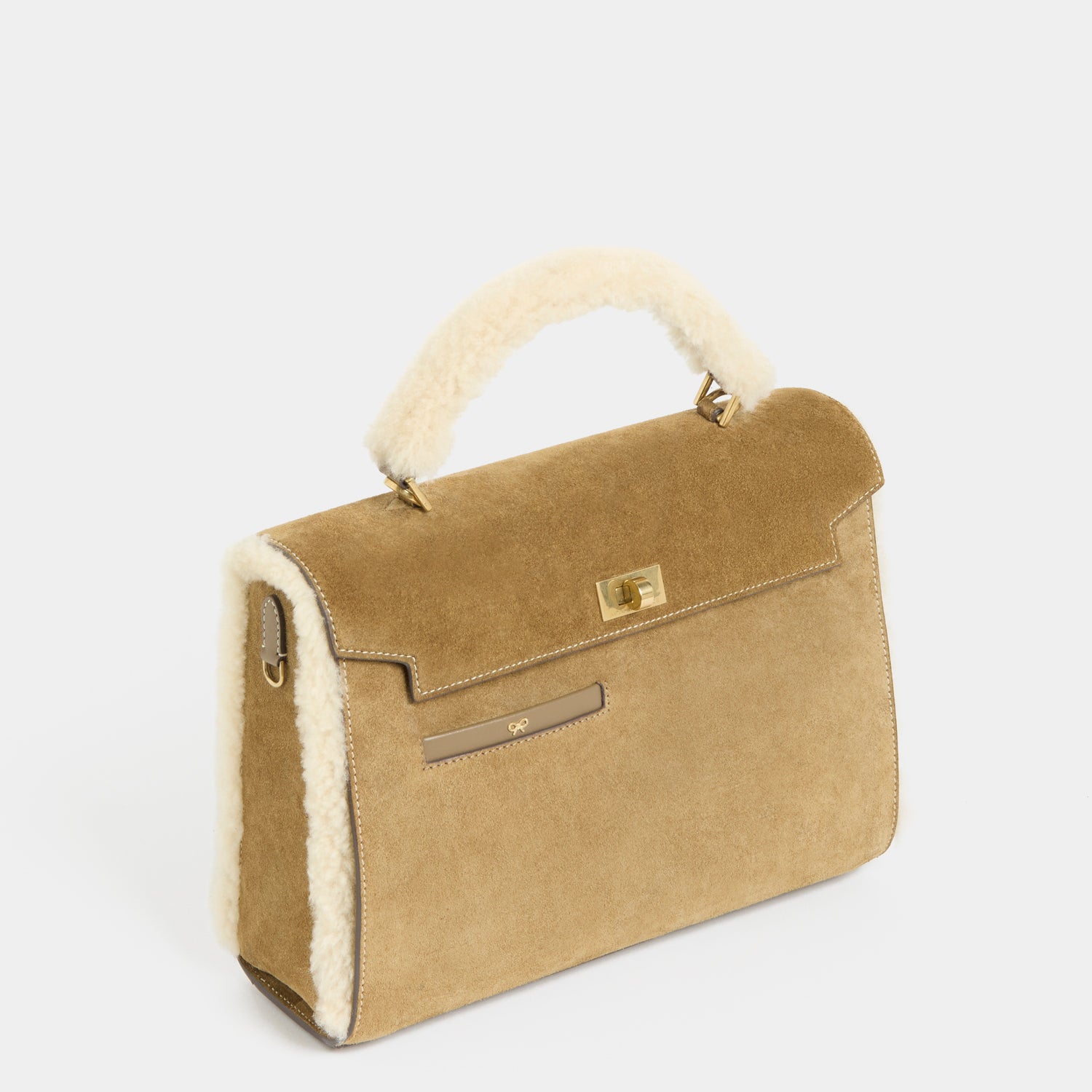 Mortimer Shearling Top Handle -

          
            Shearling/Suede Leather in Moutarde -
          

          Anya Hindmarch UK
