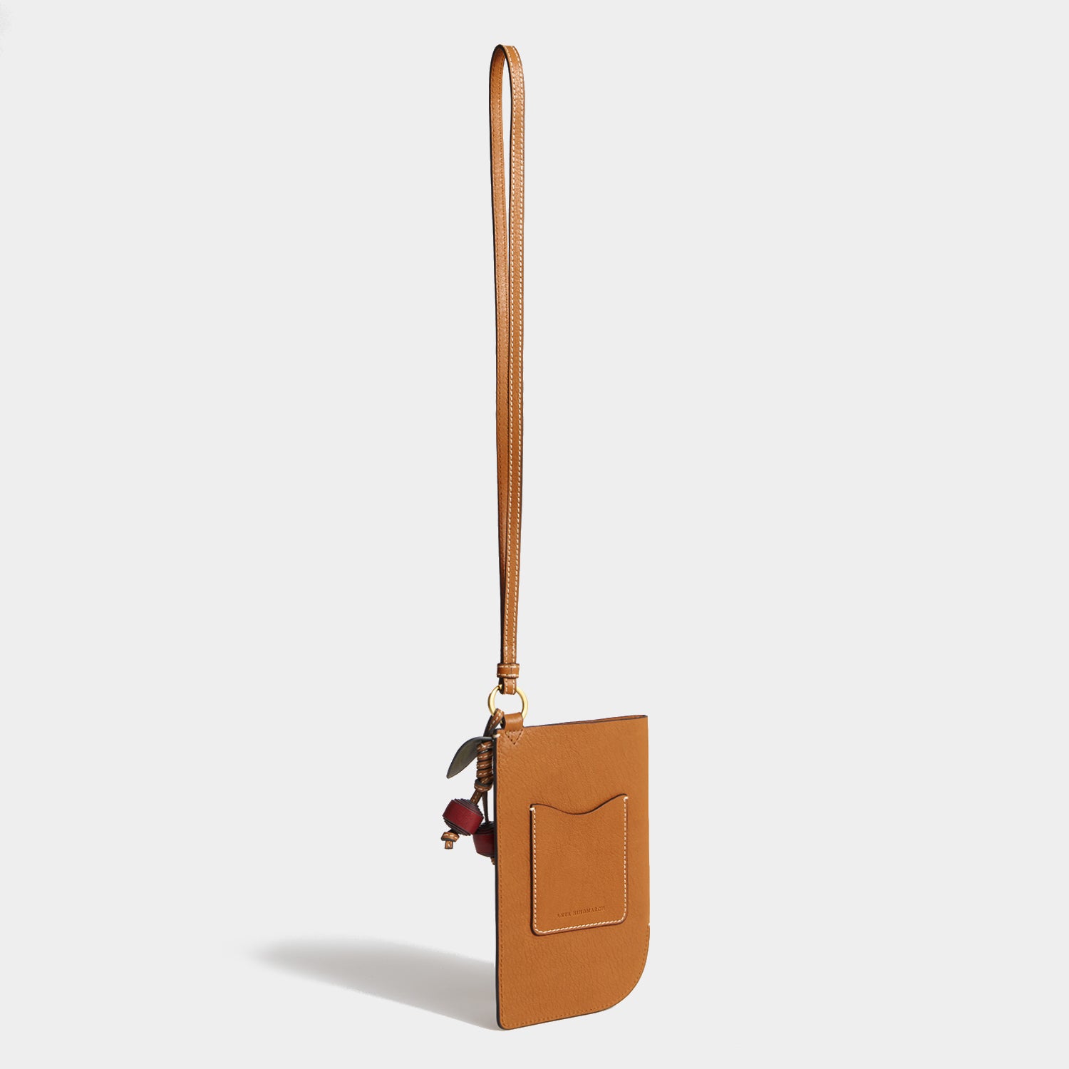 Return To Nature Strap Phone Pouch -

          
            Natural Grain Leather in Pecan -
          

          Anya Hindmarch UK
