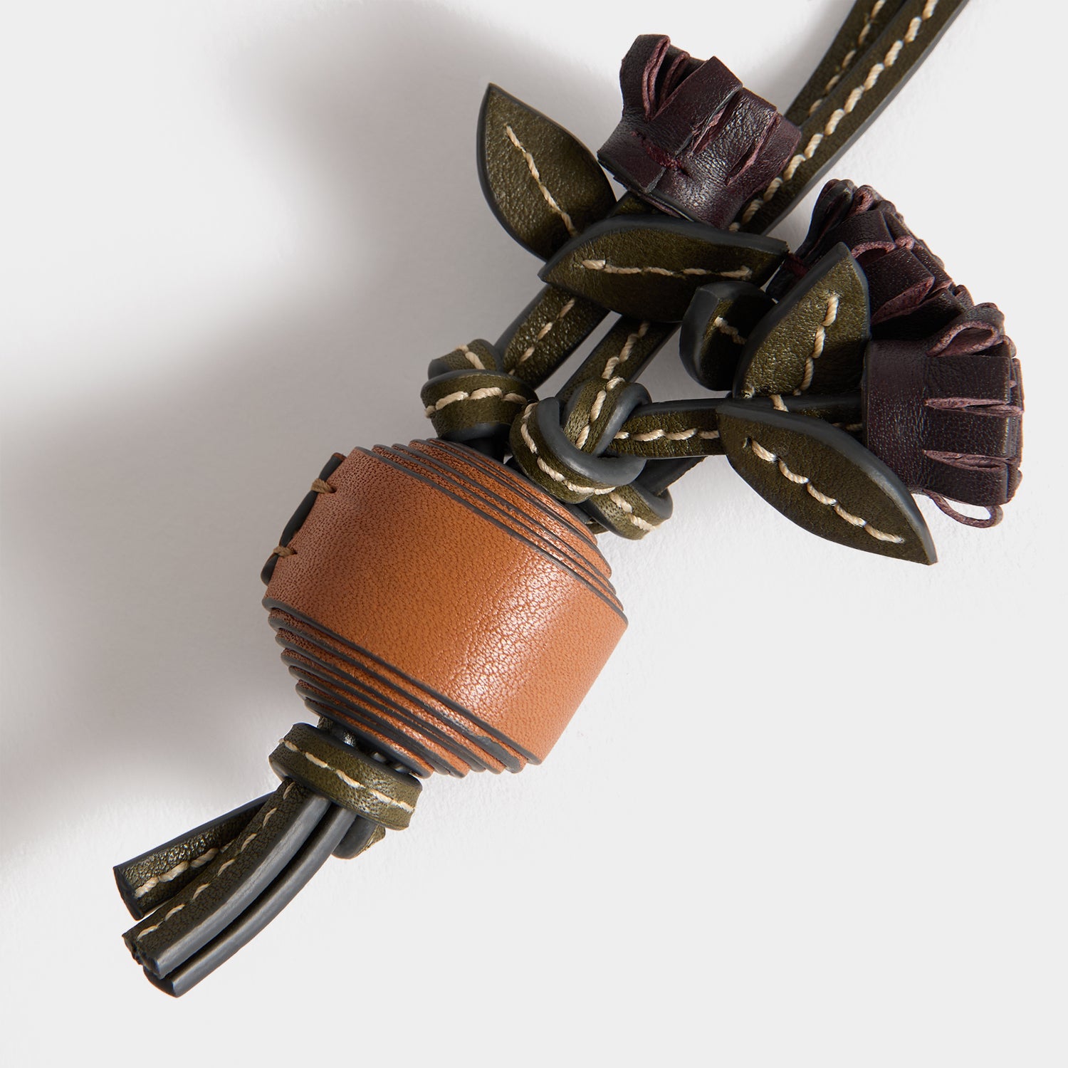 Return to Nature Potato Charm -

          
            Compostable Leather in Pecan -
          

          Anya Hindmarch UK
