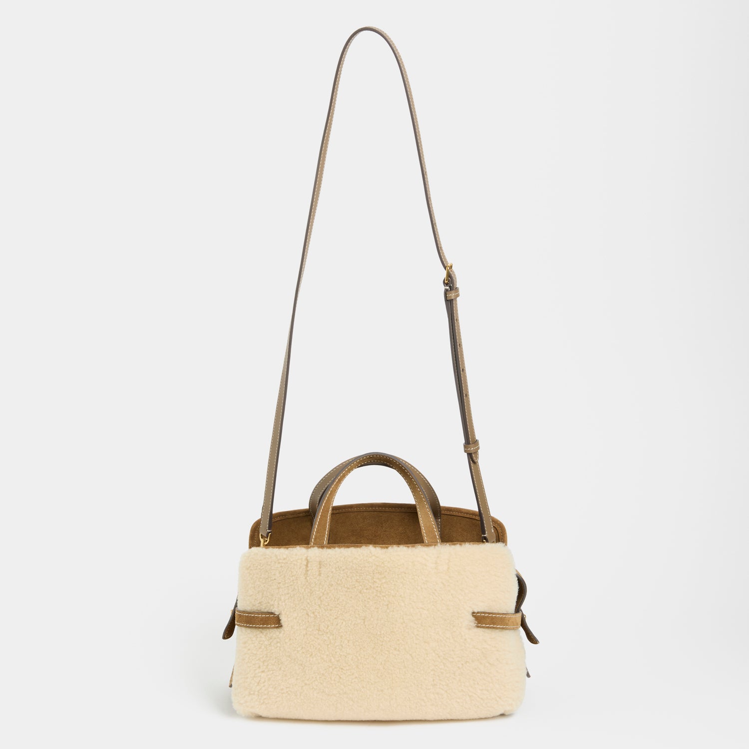 Wilson Shearling Cross-body -

          
            Shearling/Suede Leather in Moutarde -
          

          Anya Hindmarch UK
